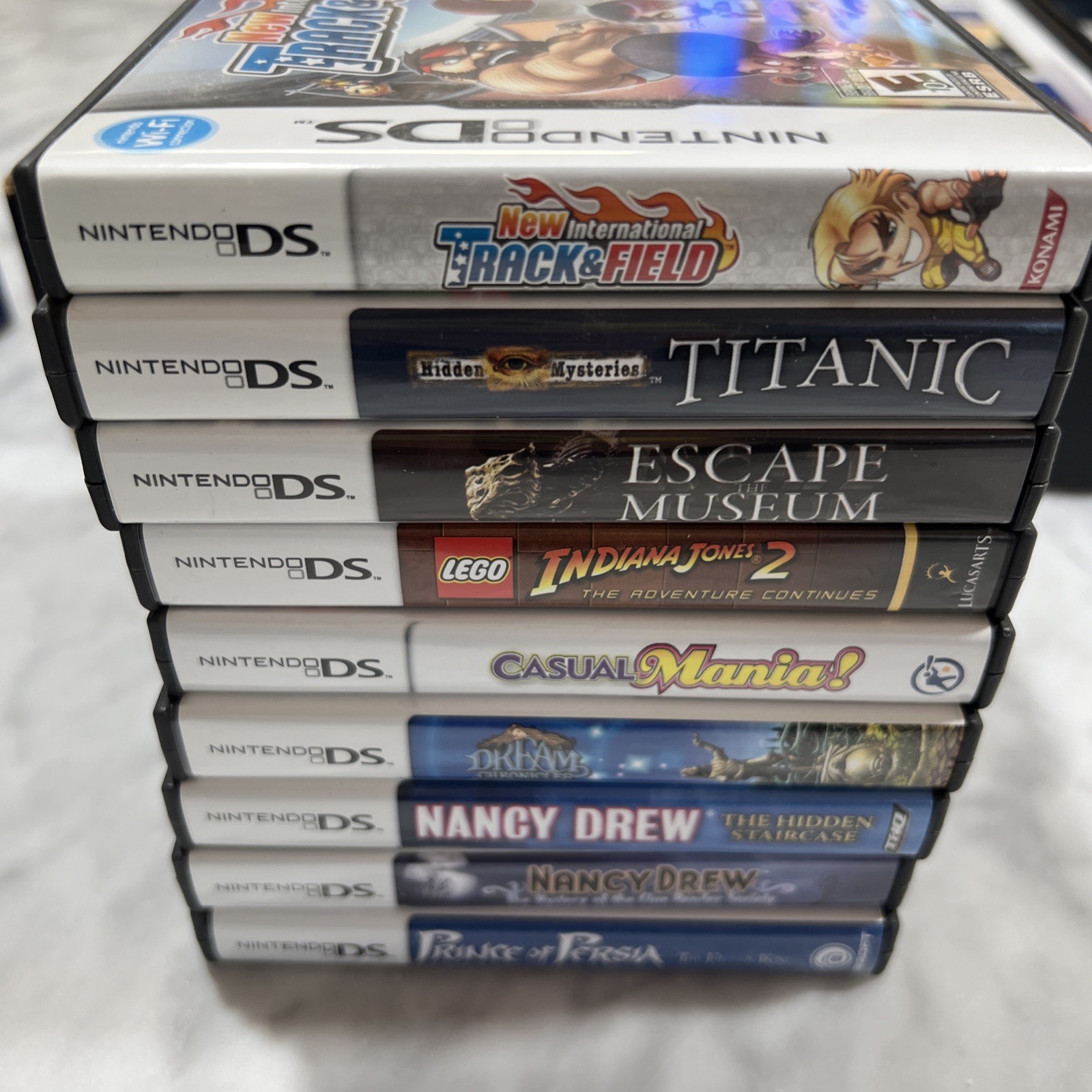 Nintendo DS Lite Cobalt Blue Console Bundle 9 Games New Battery Charger Cases