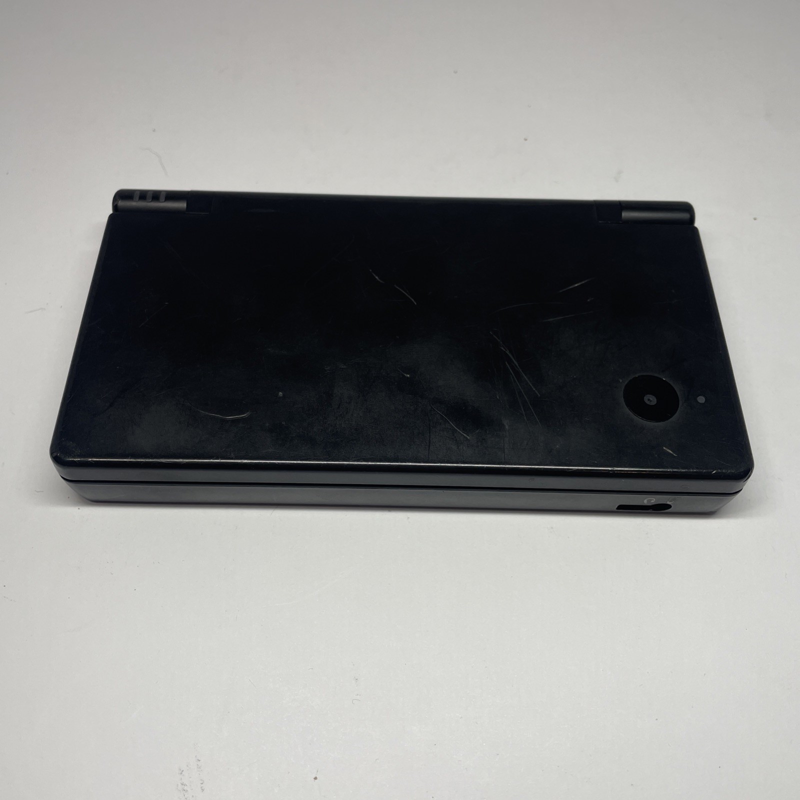 Nintendo DSi TWL-001 Black handheld system w/ Mario Bros -needs charger