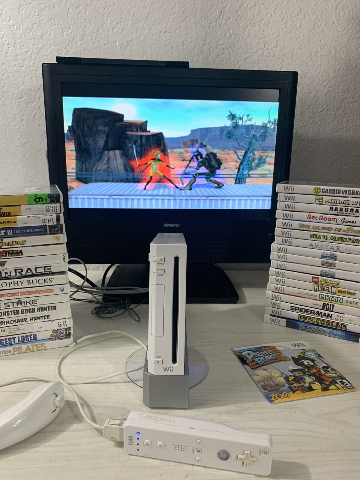 Nintendo RVL-100 Wii Bundle with 35 Games 1 controller 1 Nunchuk Stand Cables