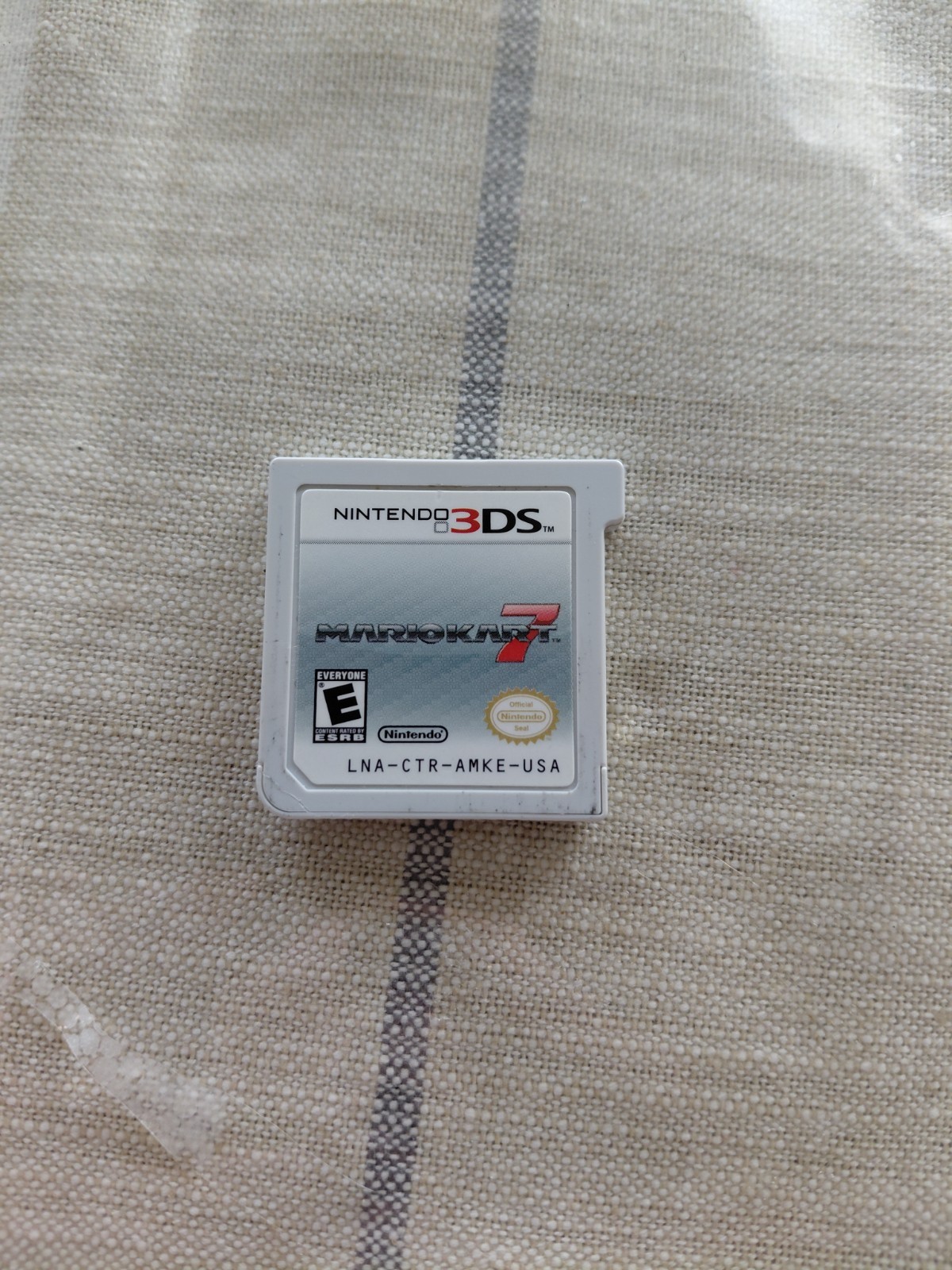 2ds with Mario cart 7 no charger, no stylus.