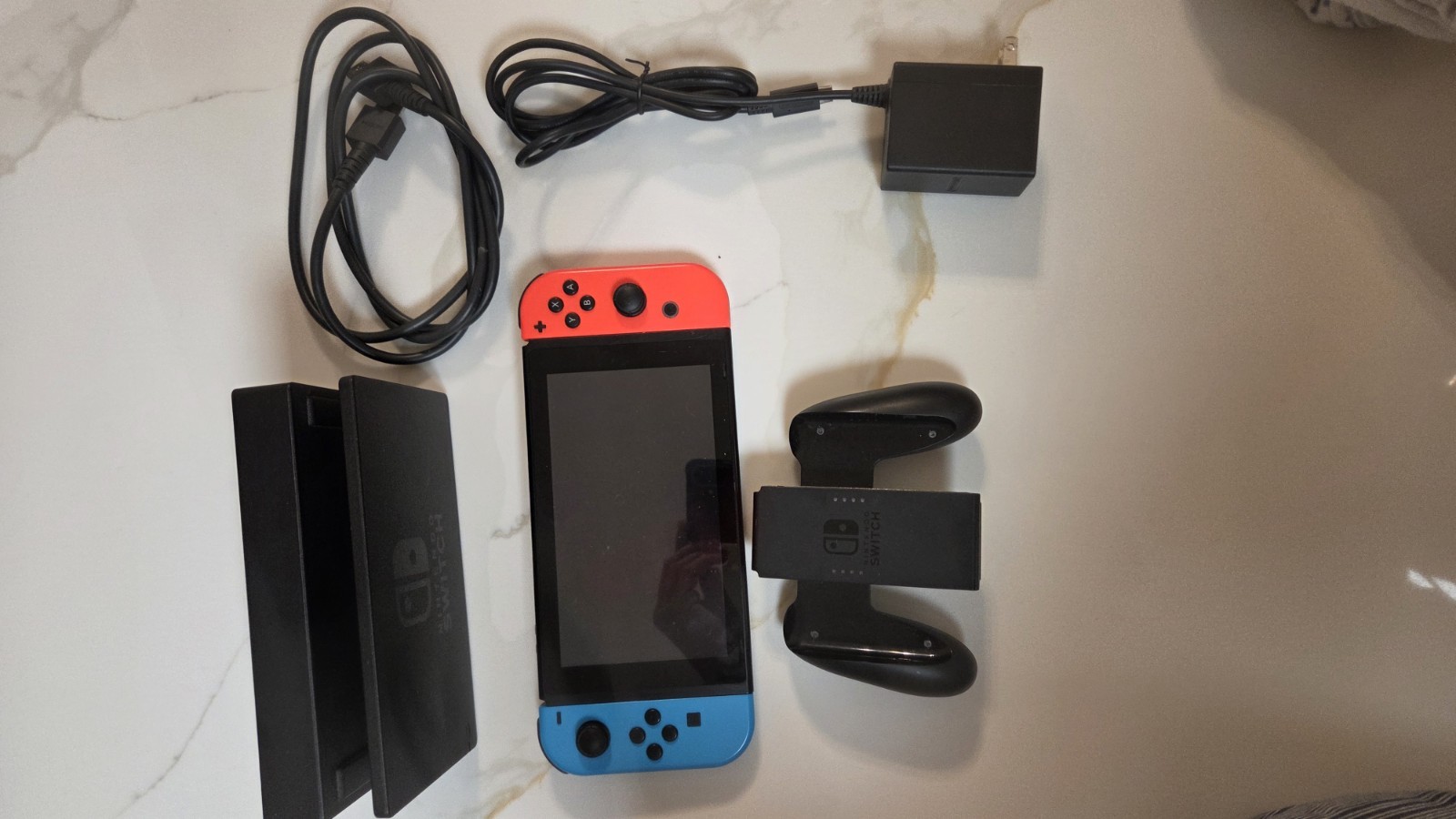 Nintendo Switch Console 128GB With Dock, Joycon Grip, And Travel Case