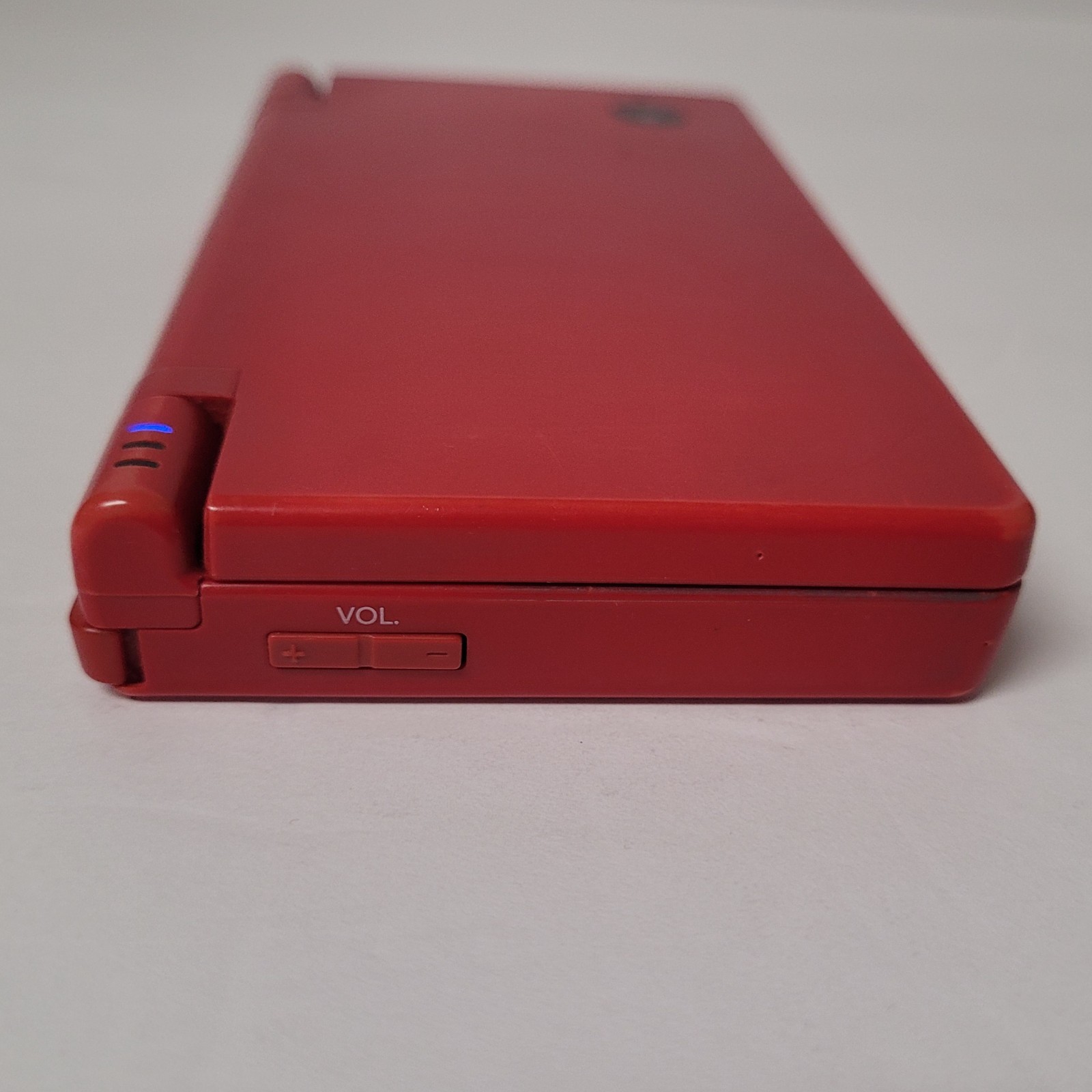Nintendo DSi Red Handheld Console Game System w/ Charger Stylus Manual & Game