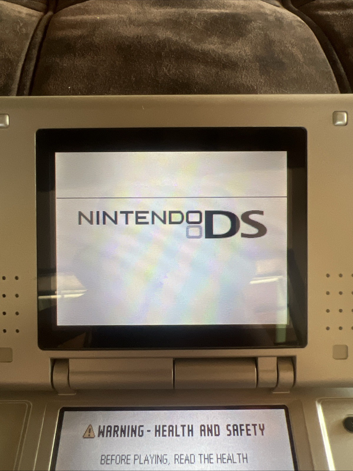 Titanium silver Original Nintendo DS with charger and stylus
