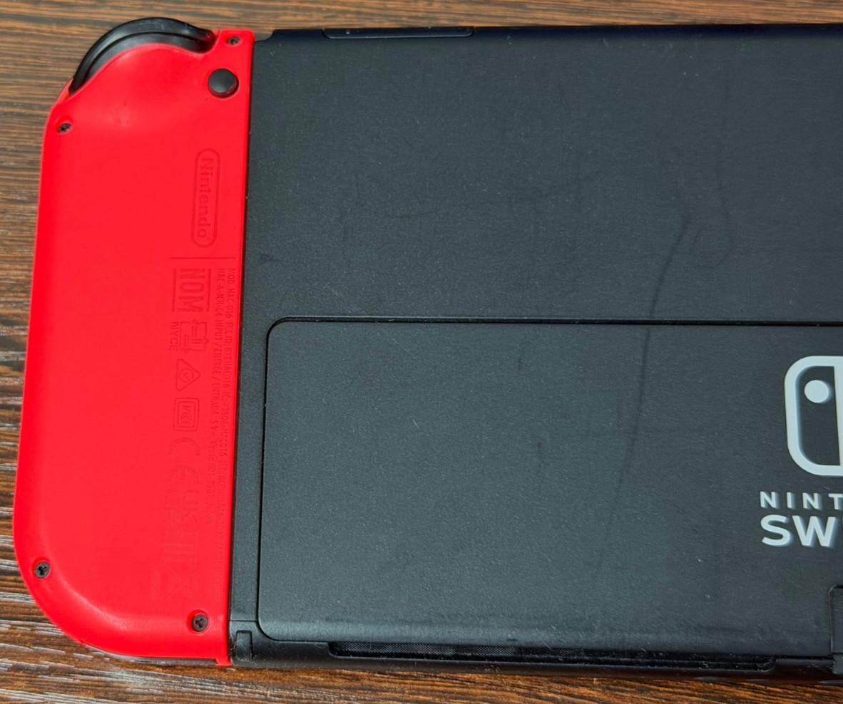 Nintendo Switch OLED Model 64GB Neon Red White Joycons – Good Used Condition