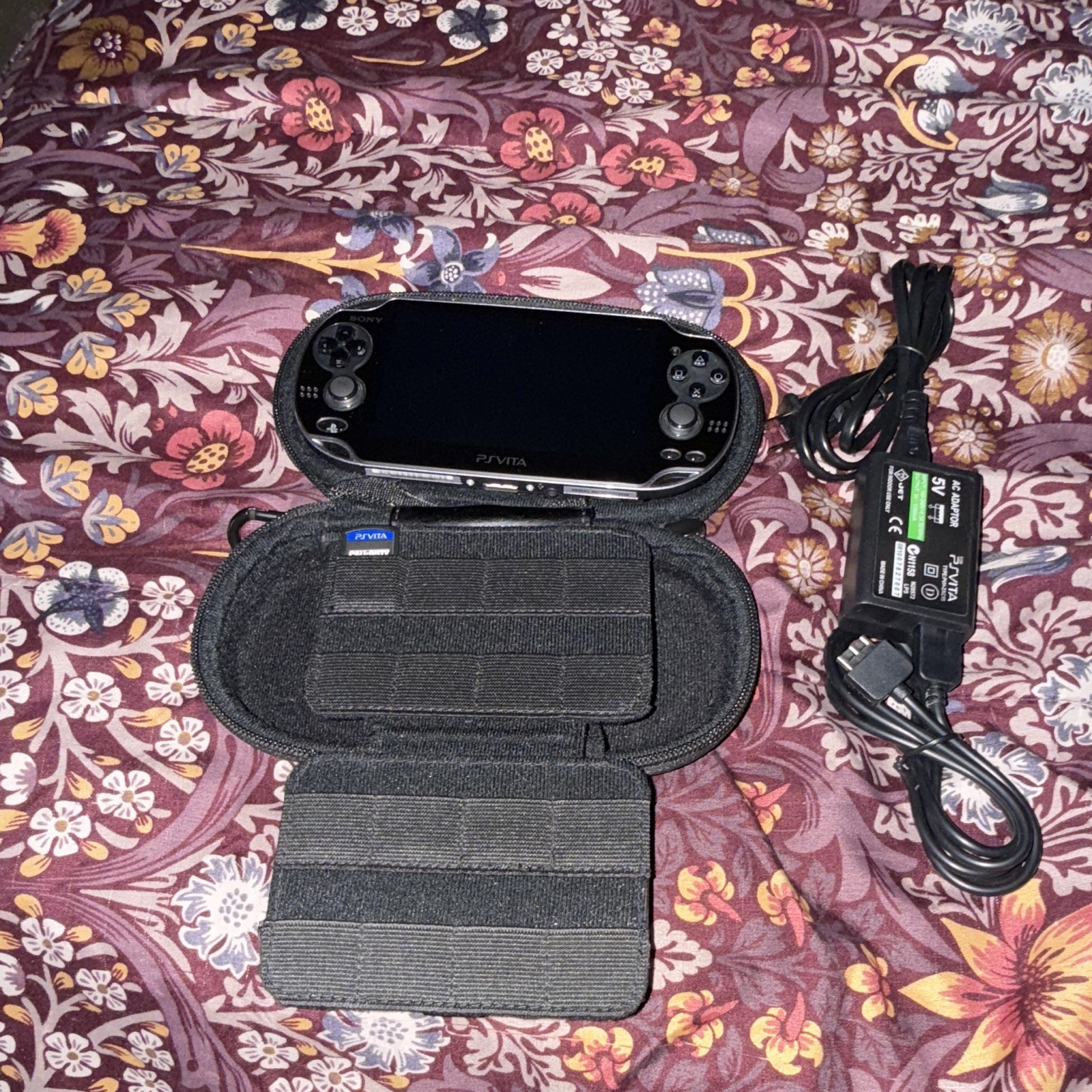Sony PS Vita PCH-1001 Black Handheld Wi-Fi Console w/ Case &, Charger, and Game