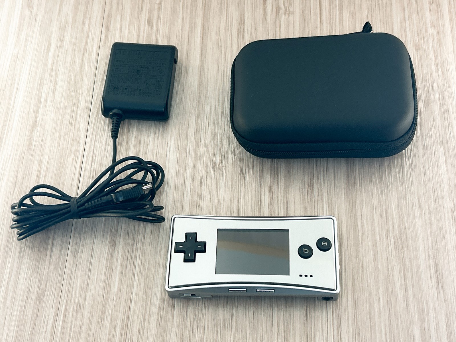 Nintendo GameBoy Micro Silver Console Tested w/ OEM AC Charger – Near Mint