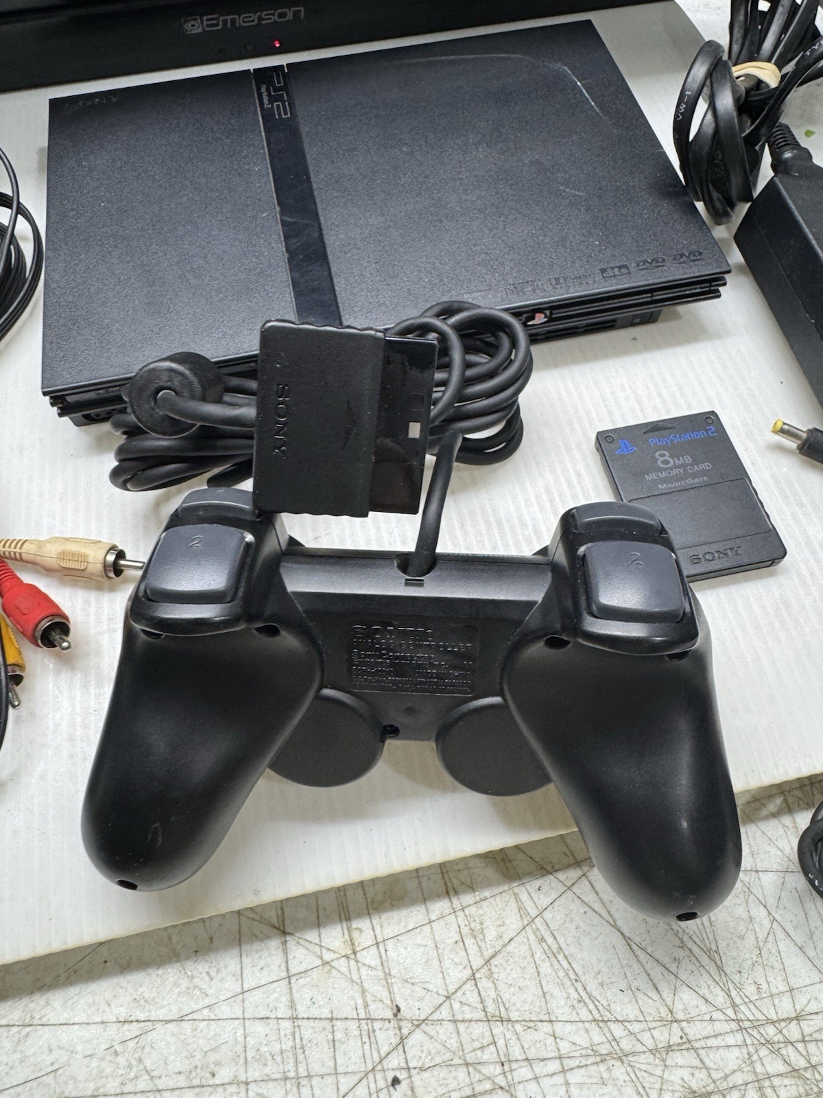 Sony PlayStation 2 Slim Black OEM with 1 Controller, 8MB Memory Card – Tested