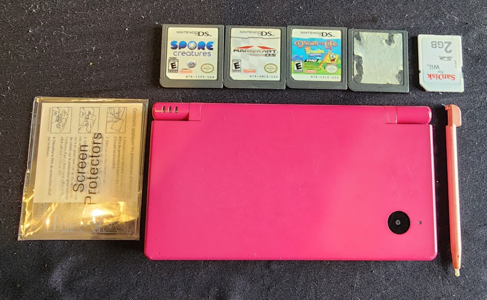 Pink Nintendo DSi System W/ 4 Games, 4GB SD, Stylus. DMG Tested! No Charger.