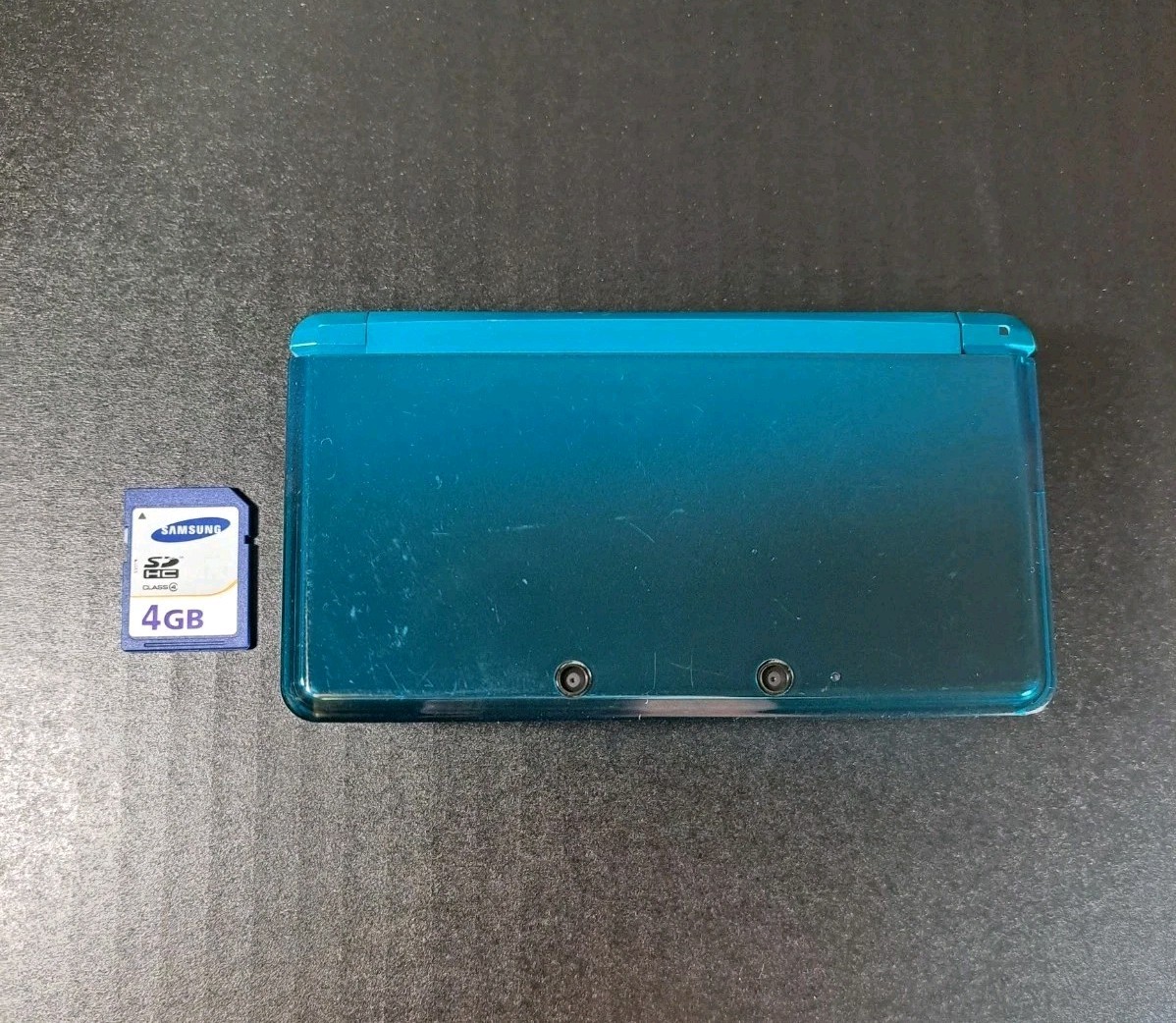 Nintendo 3DS Aqua Blue Handheld Console 3D Technology w/ Nyko Powerpak & 4GB SD