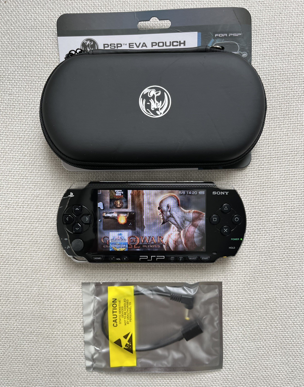 Sony PSP-1000 | CFW | Charger, Case, 64gb MicroSD, 50 games included (Tested)