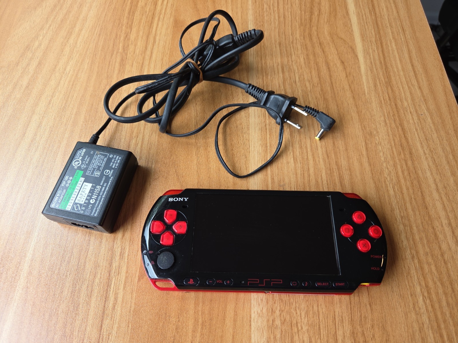 Sony PSP 3000 Console Black / Red – Good Condition + Charger