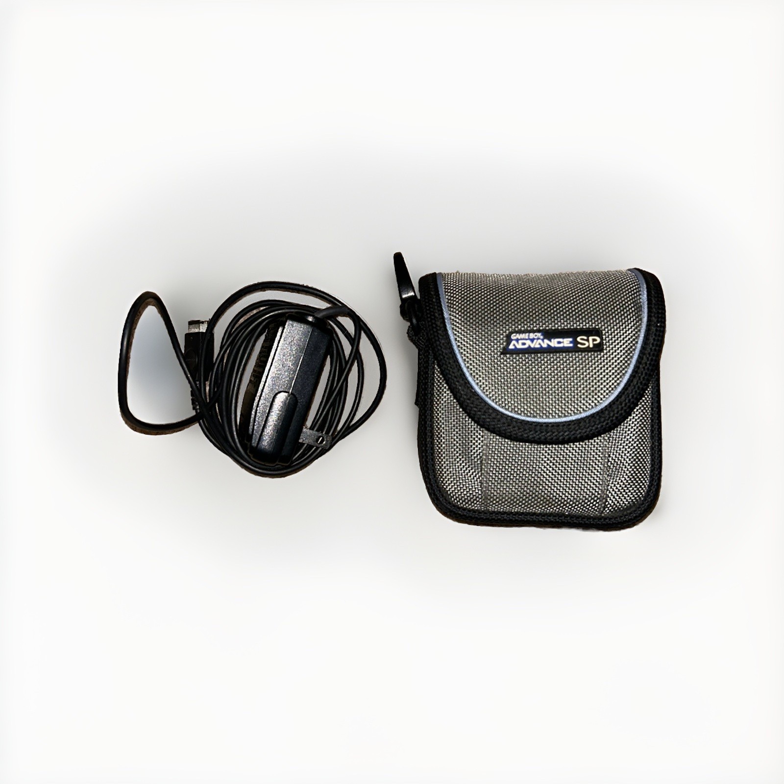 Game Boy Advance SP (AGS-001) with carrying case and charger included