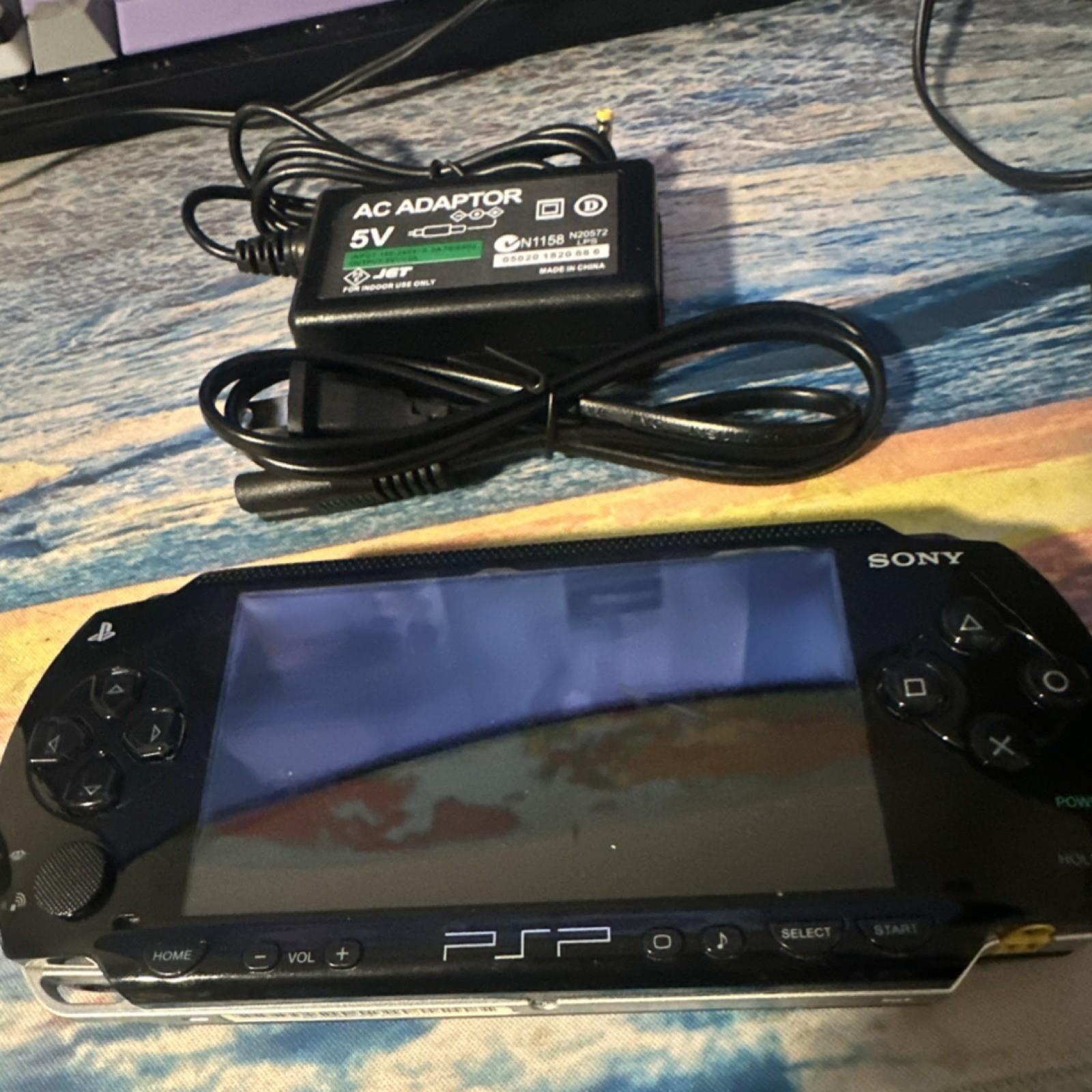 TESTED Sony PSP-1001 black console with charger game not included ALL ORIGINAL