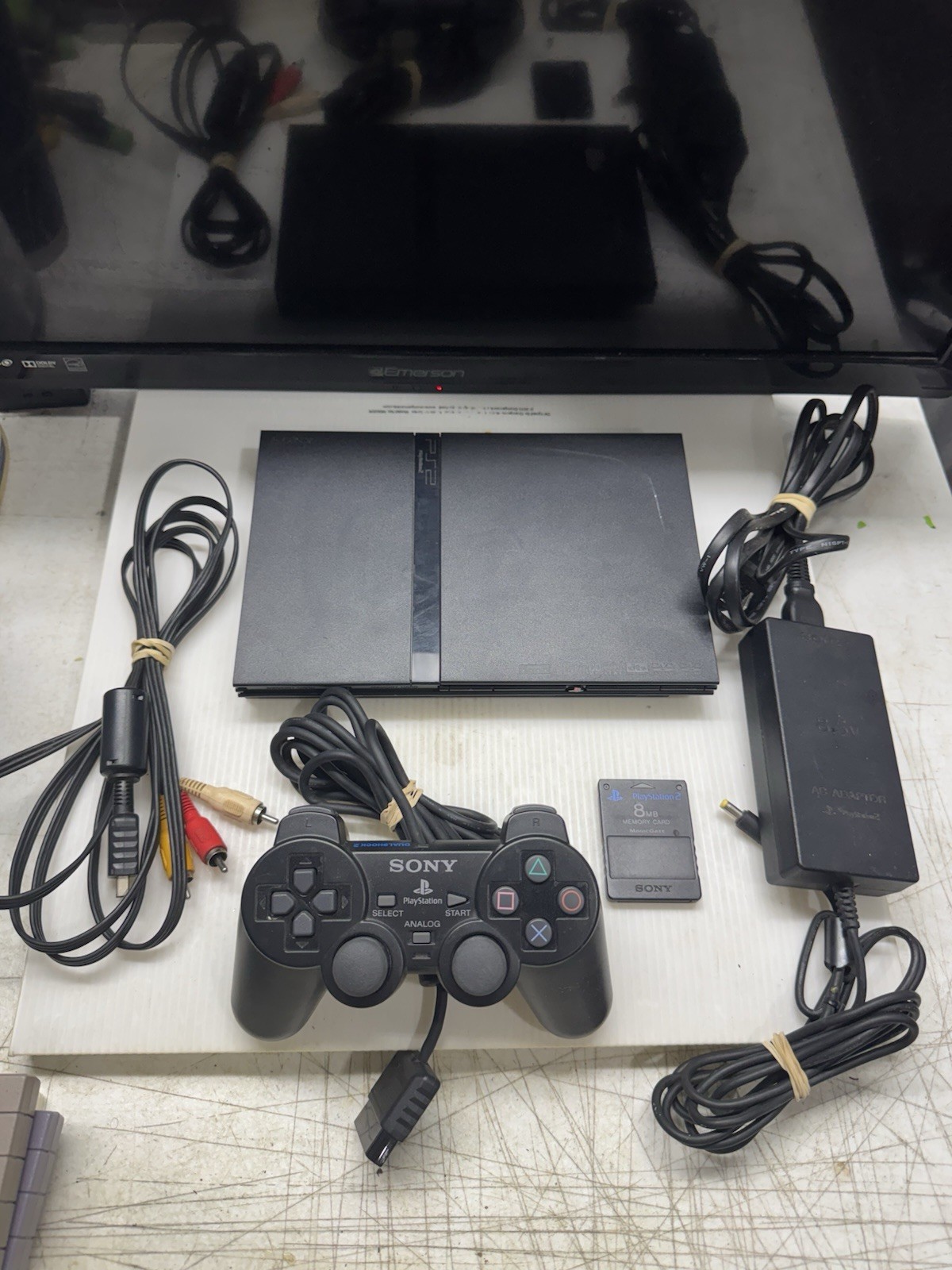 Sony PlayStation 2 Slim Black OEM with 1 Controller, 8MB Memory Card – Tested