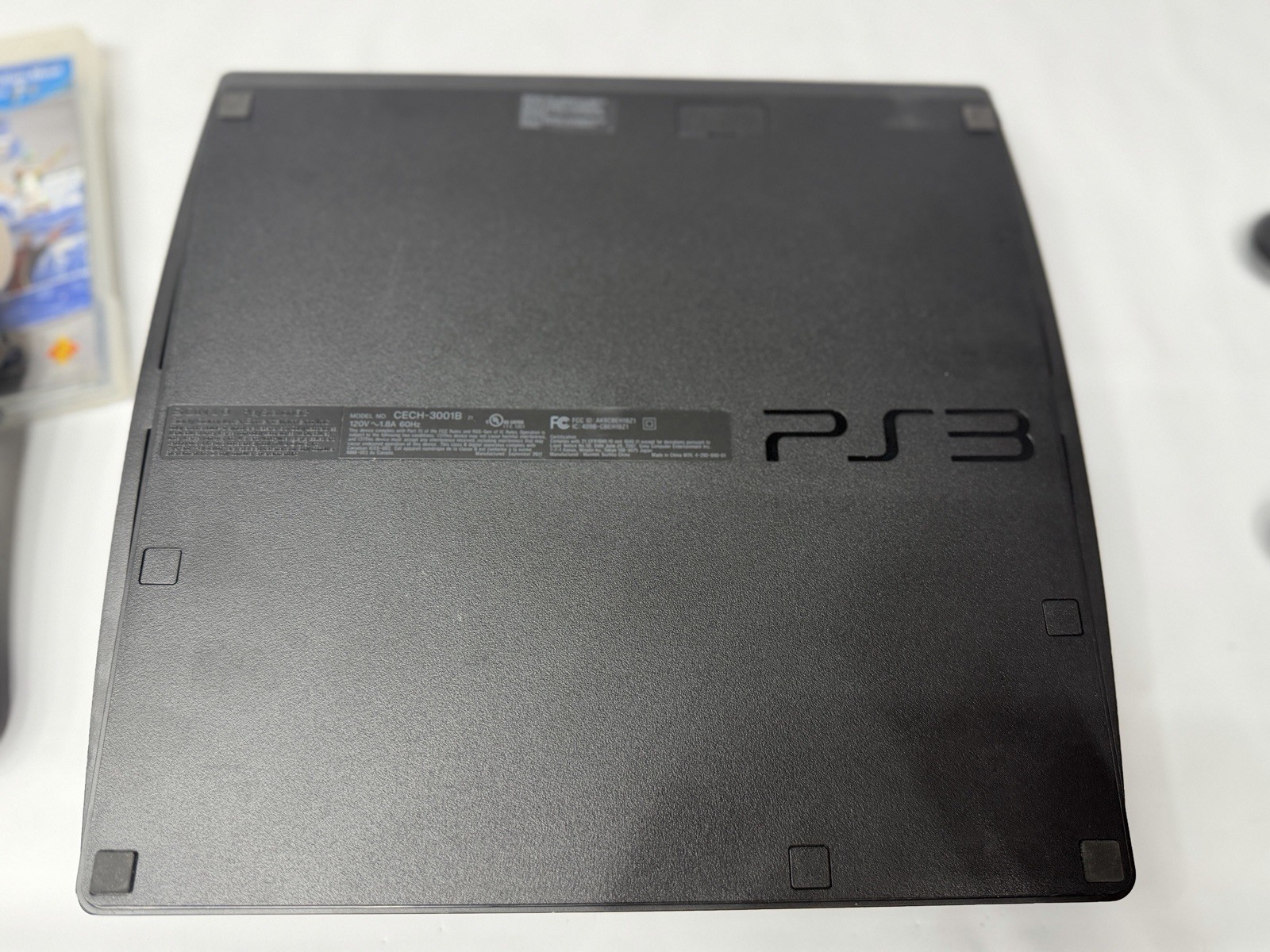Sony Playstation 3 PS3 Slim Black Console 320GB Move Sports Champions Bundle