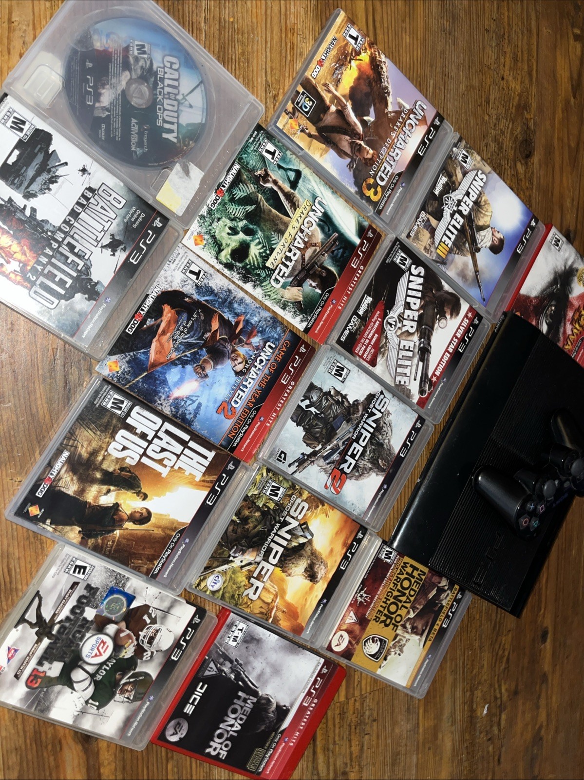 Sony PlayStation 3 Super Slim CECH-4001B 250GB Black Games Controller Bundle