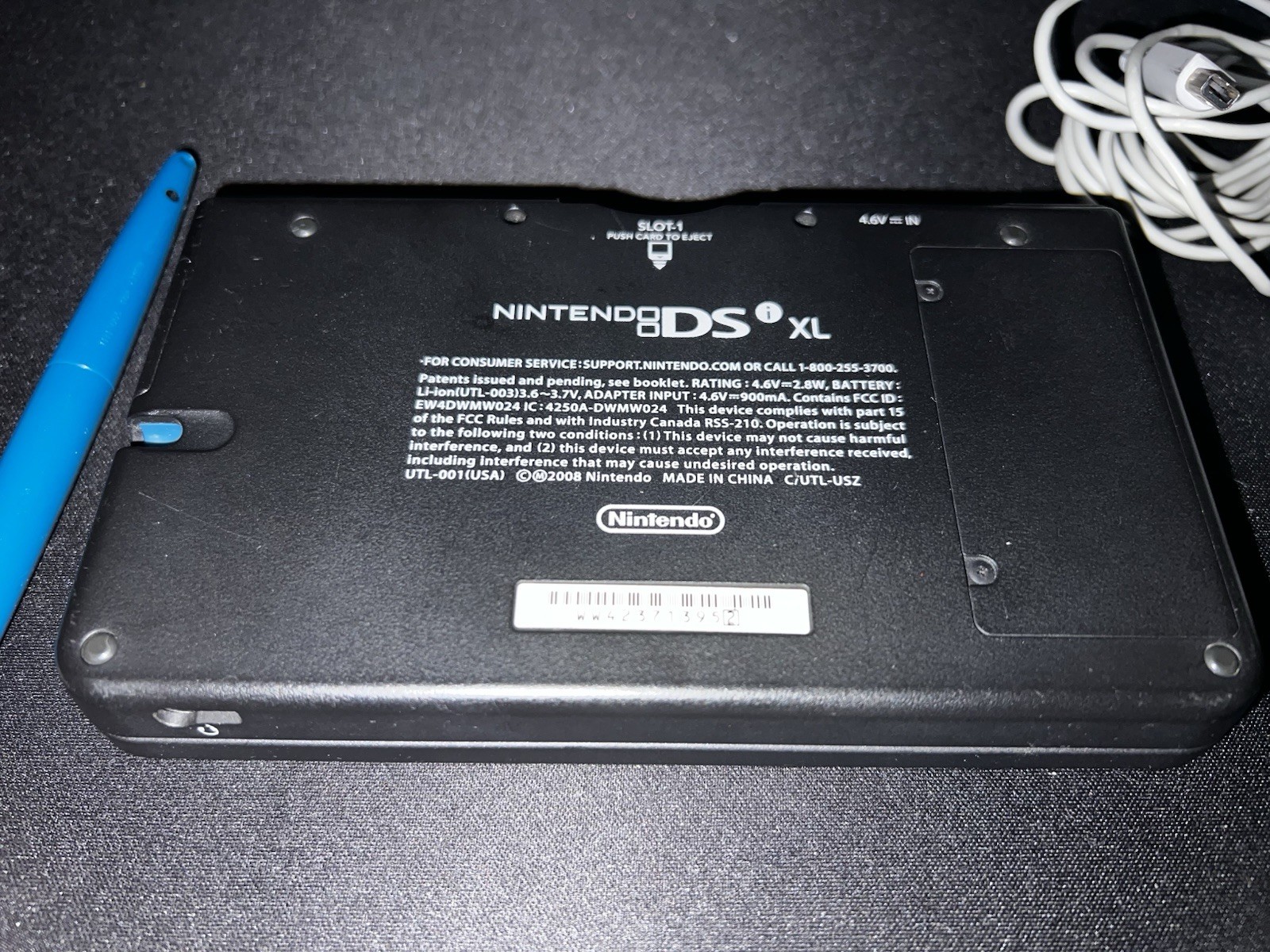 Nintendo DSi XL Handheld System – Midnight Blue w/ 7 games Bundle.