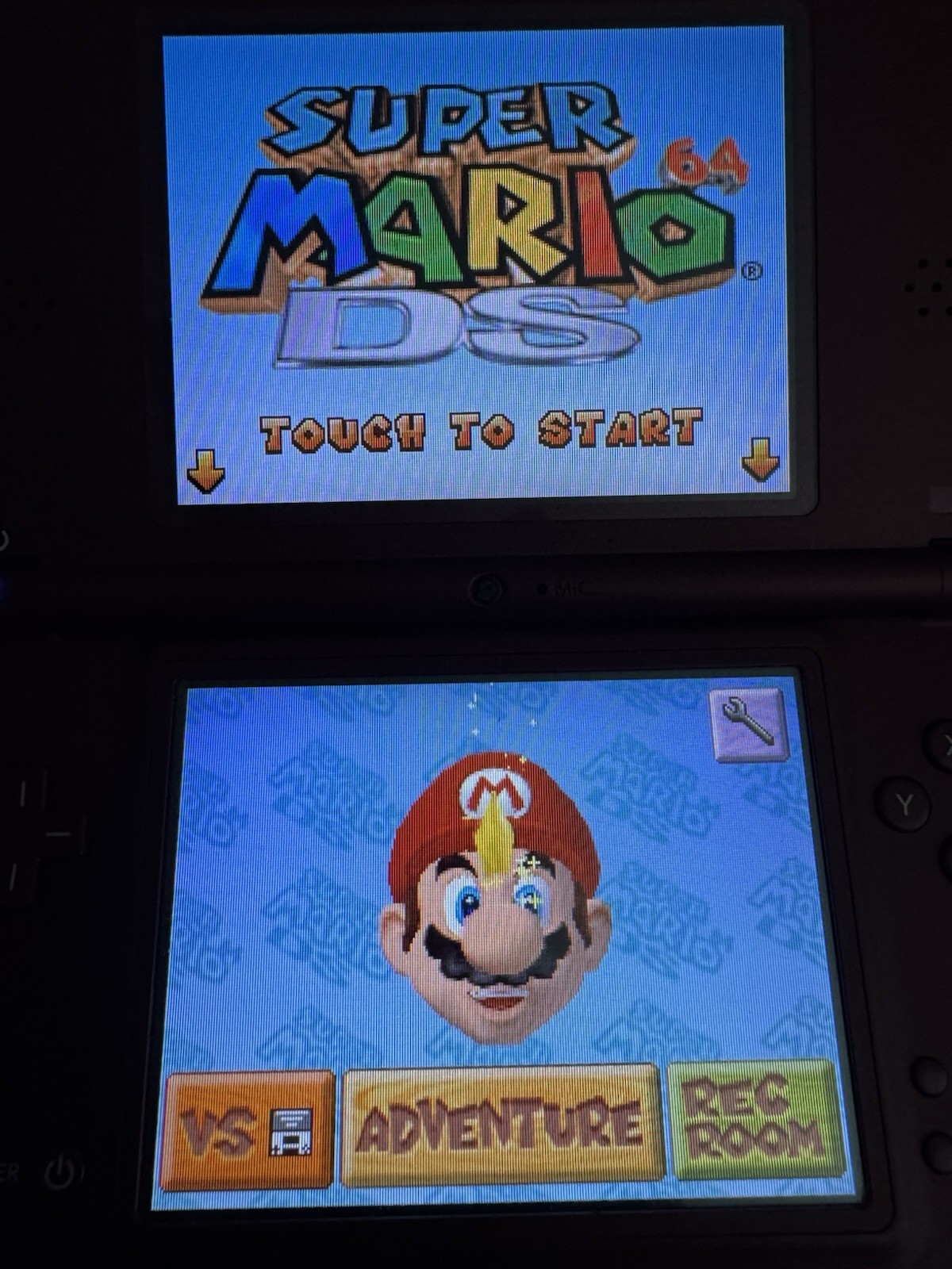 Nintendo DSI XL Burgundy with Charger, Stylus Pen, Pouch, and 7 Games Included!