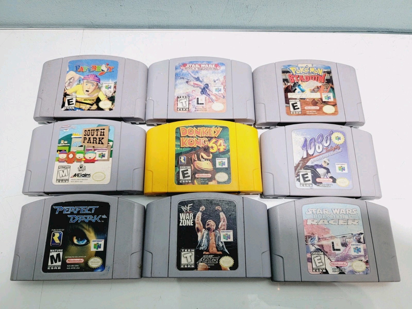 Nintendo 64 N64 Console Bundle w/ 2 Controllers & Dk + 8 Games Xpantion Pak