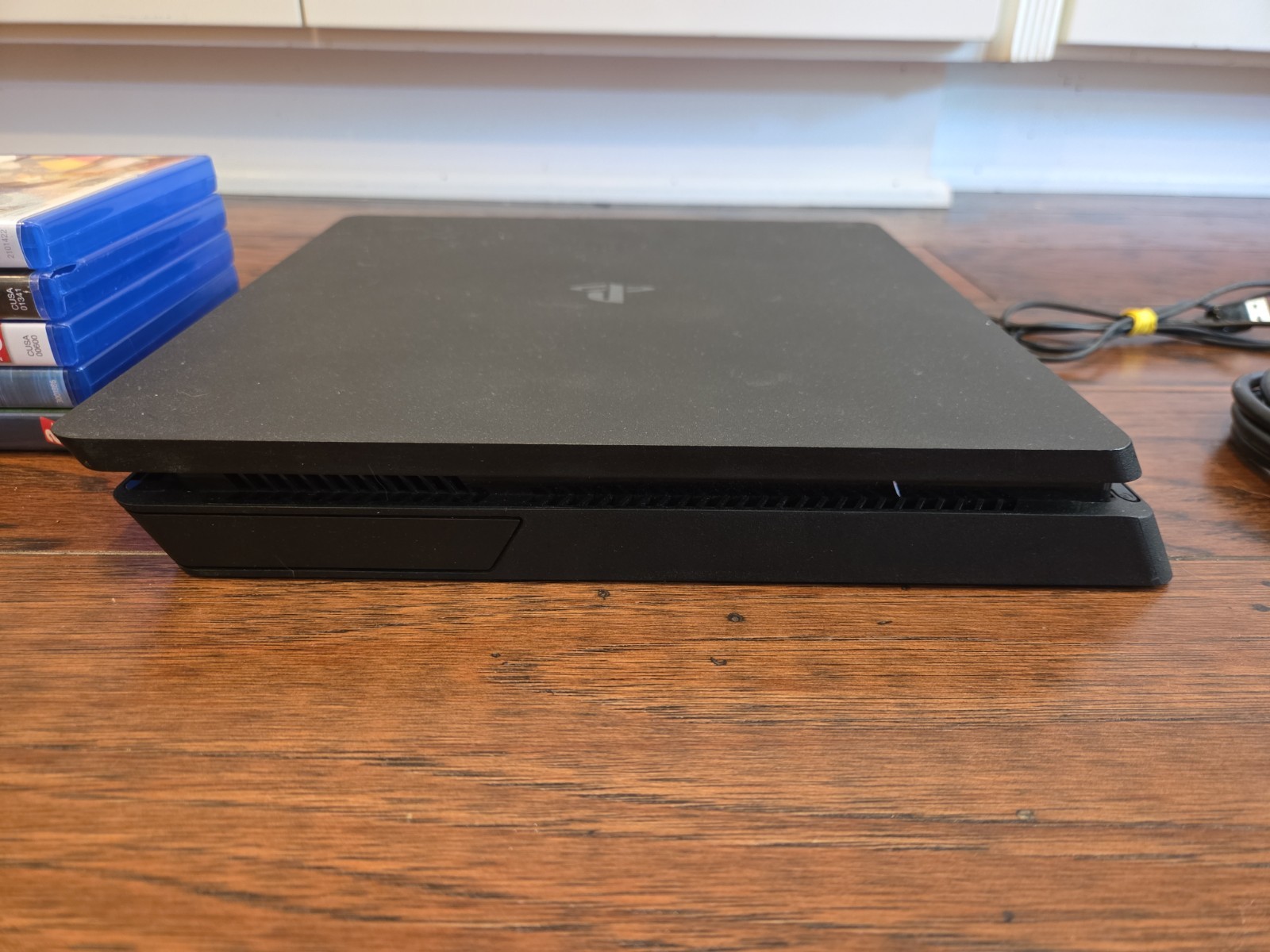 Sony PlayStation 4 Slim 1TB Console – Bundle – Controller & 5 Games