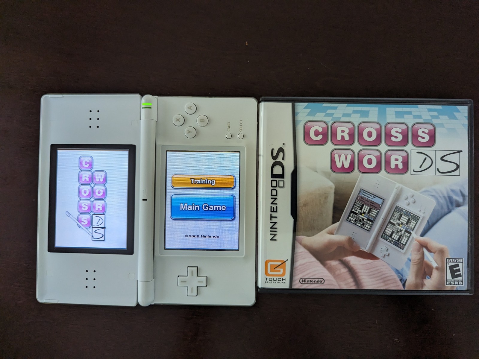 Nintendo DS Lite with Charger, Hard Case, soft case, 15 games in cases.