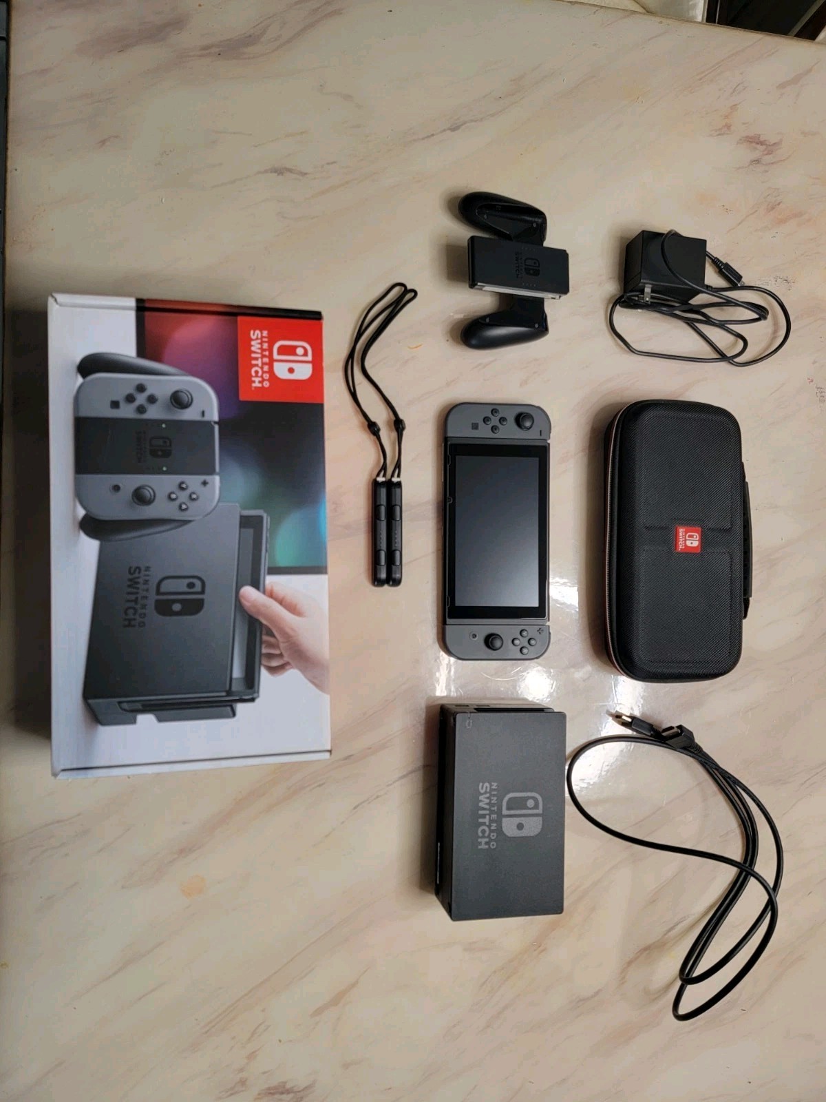 Nintendo Switch 32GB Gray Console with Dock, Joy-Con Grip/Straps, Case + Extras