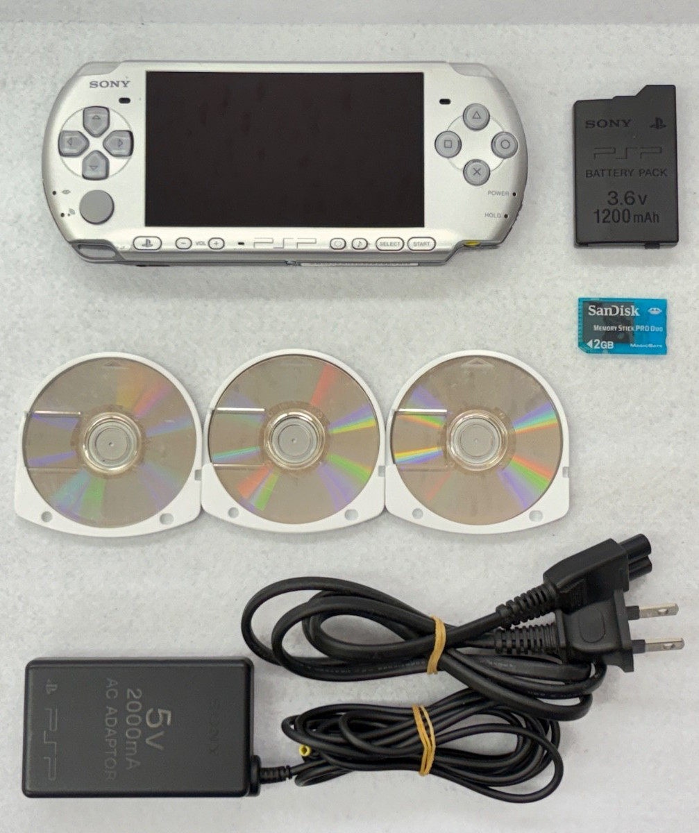 TESTED SONY PSP 3000 SILVER Console + Charger + battery + 3 game Region free 2GB