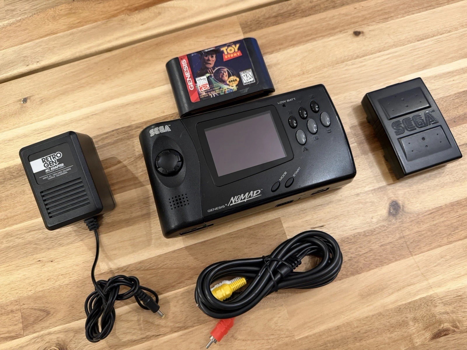 *RESTORED* OEM recapped SEGA Genesis Nomad bundle + aa battery pack