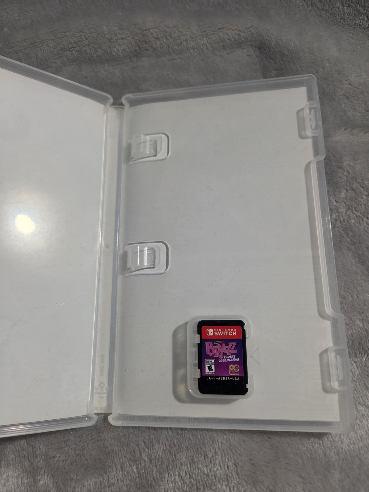 Nintendo Switch Lite Coral with Bratz, Monster High, & Peppa Pig Games, Charger