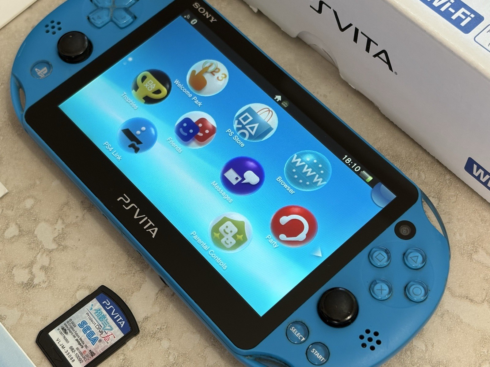 Sony PS Vita PCH-2000 Complete In Box – Aqua Blue 4GB Very Good Condition
