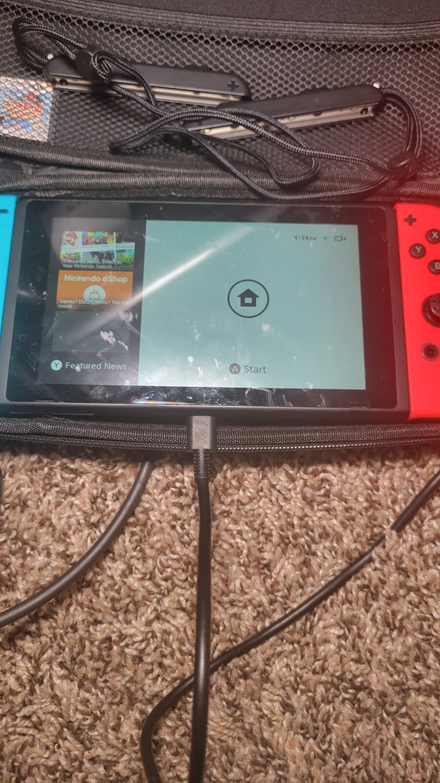 Nintendo Switch with Blue and Red Joy-Con Controllers & Mario Kart