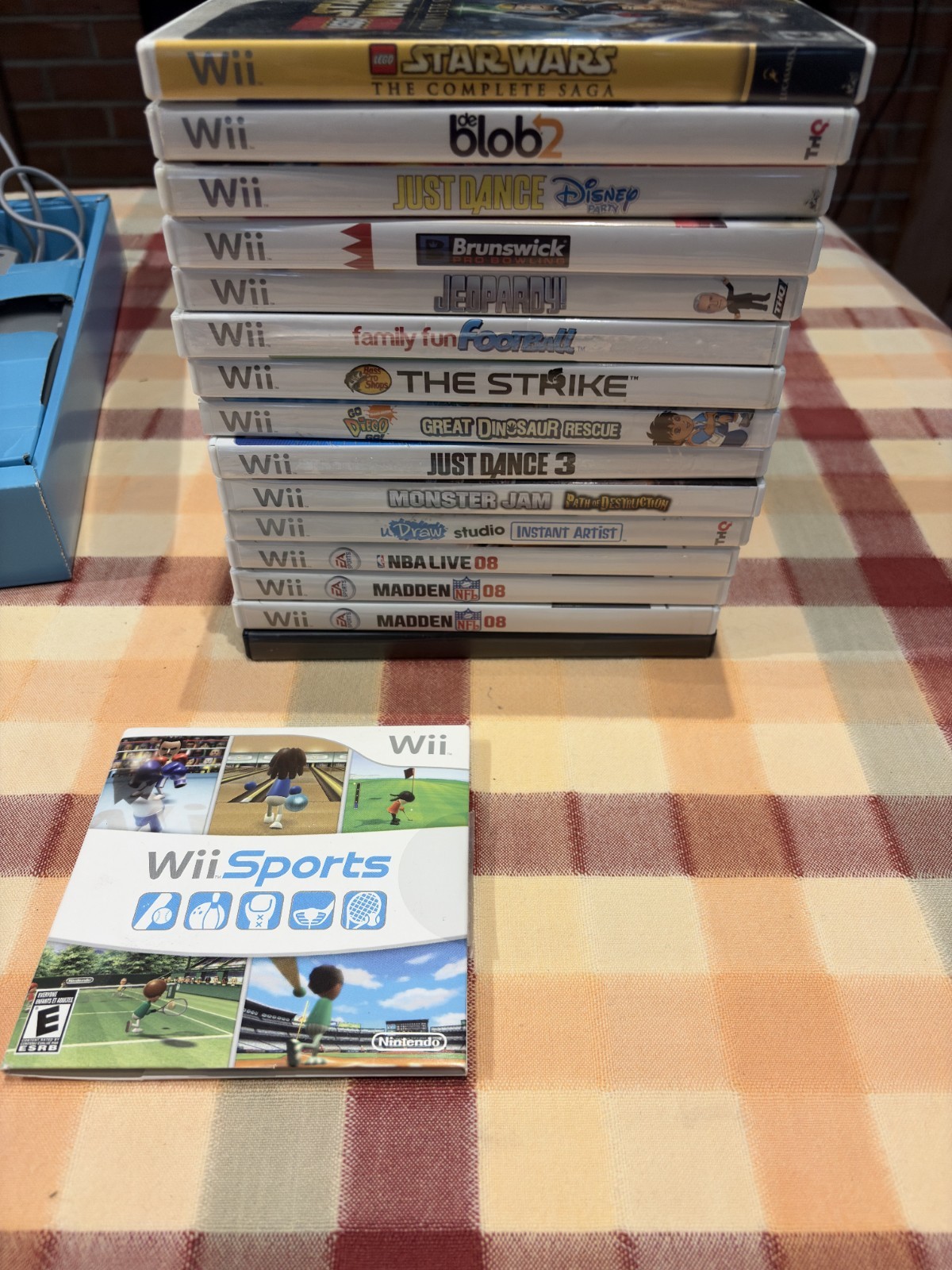 Nintendo Wii with assortment of games bundle – Original Packaging included