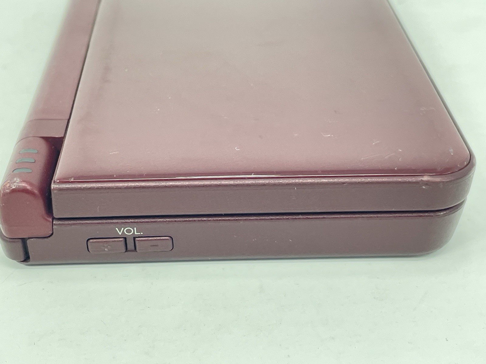 Nintendo DSi XL Handheld Game Console UTL-001 Burgundy W/ Charger Only Works