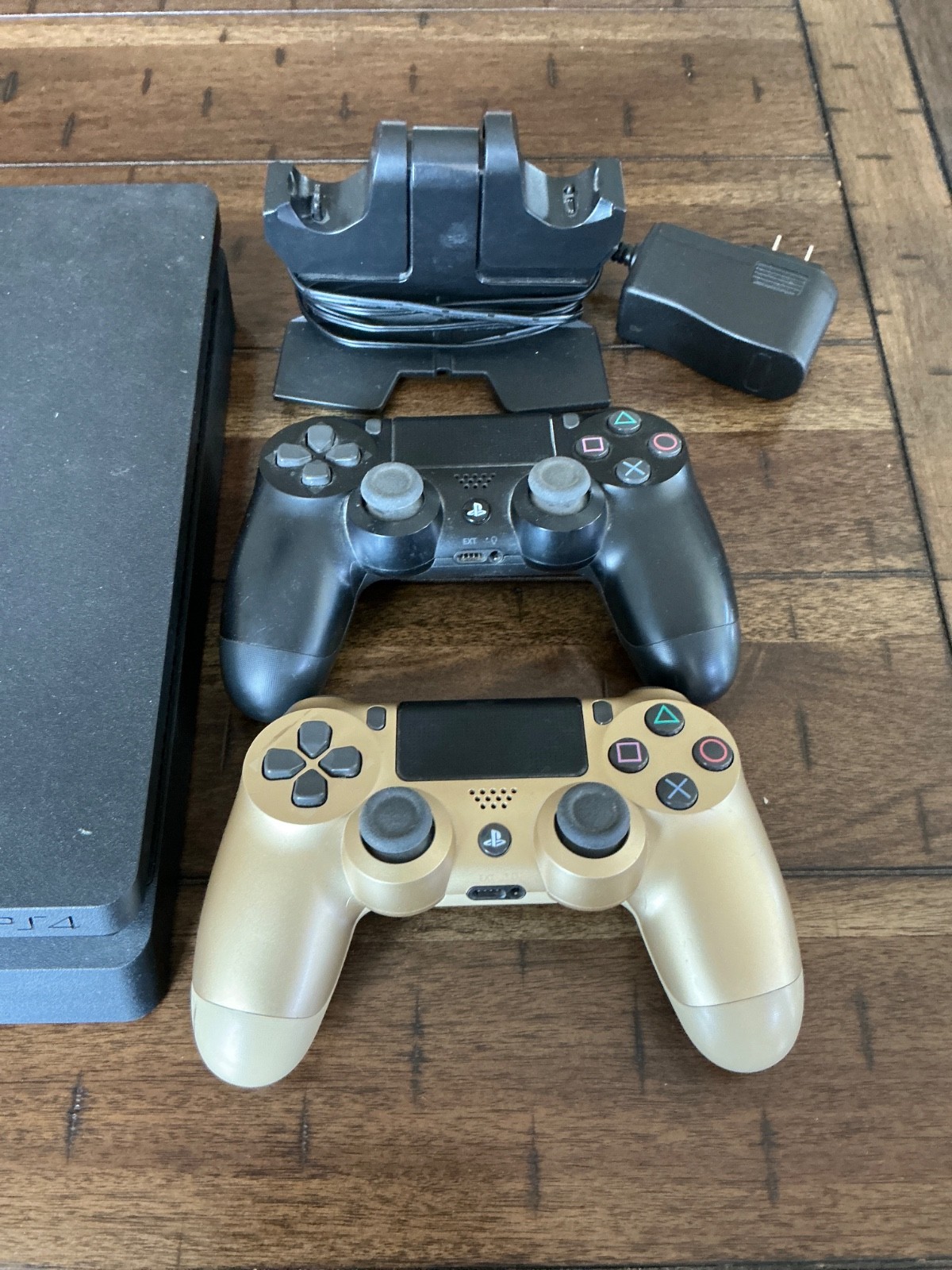 Sony PlayStation 4 Slim Console, two Controllers, Controller Dock and cables