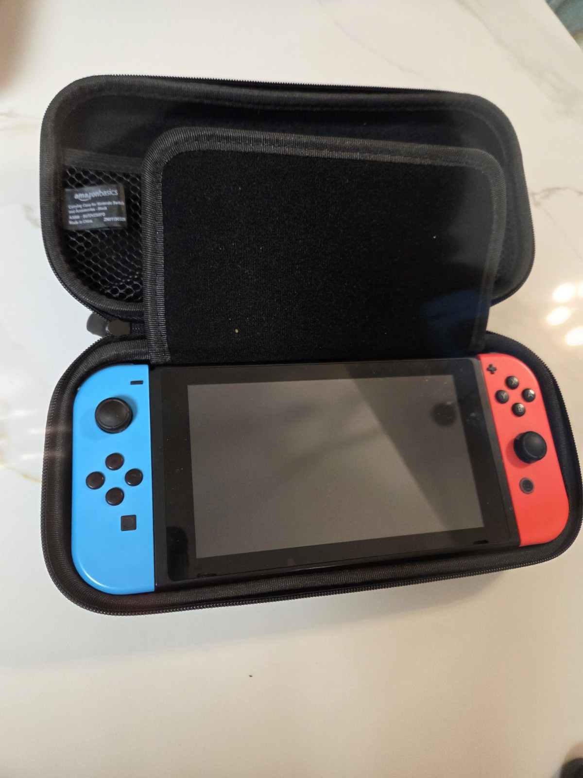 Nintendo Switch Console 128GB With Dock, Joycon Grip, And Travel Case