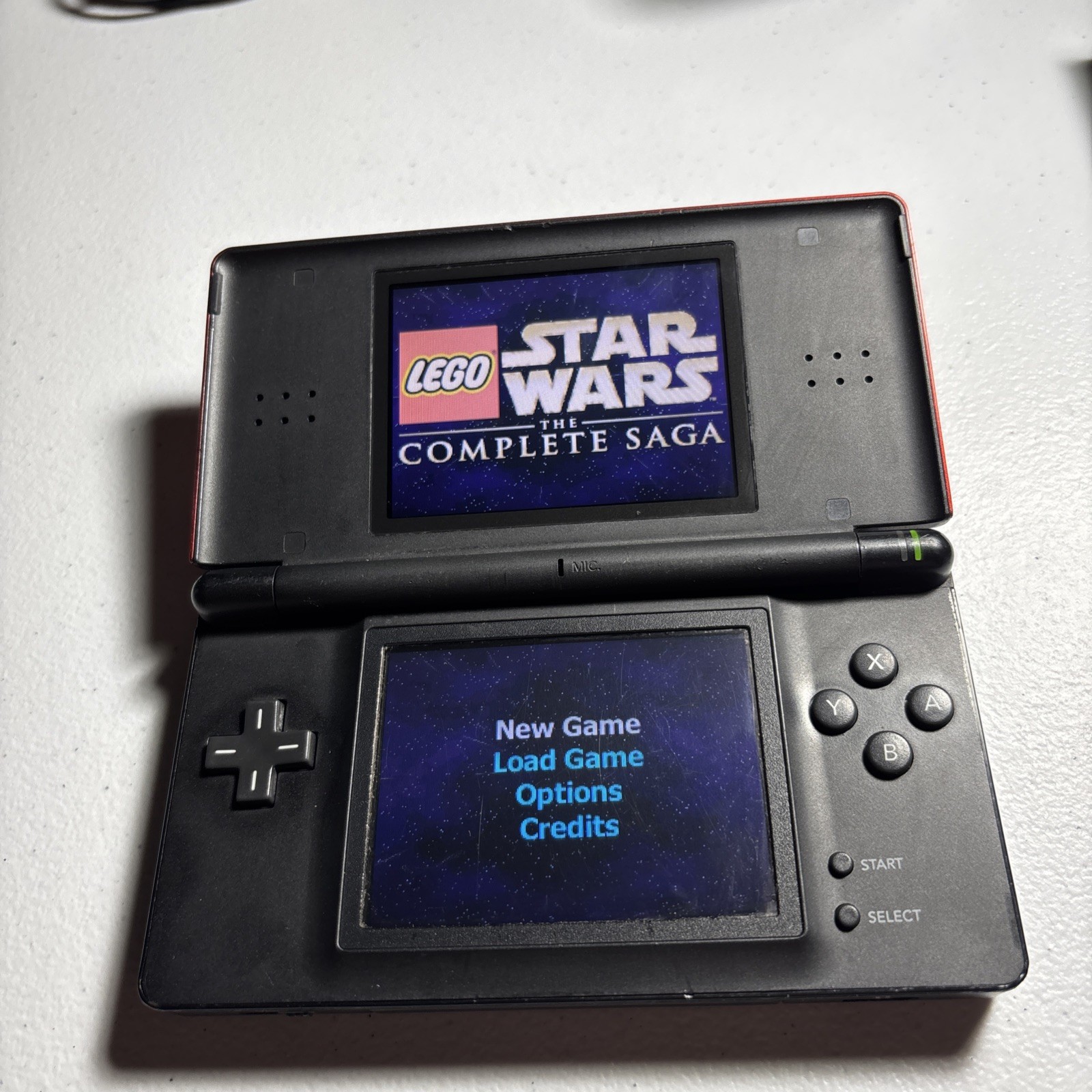 Nintendo DS Lite Crimson Handheld w oem charger-Red/Black(plus game)(no stylus)