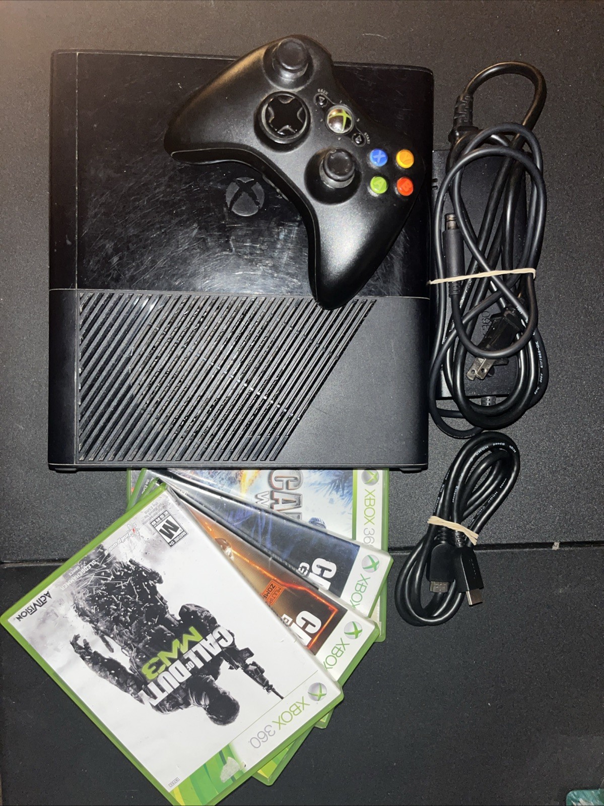 Microsoft Xbox 360 E Black 4GB Console with Power Cords And 4 Games Works
