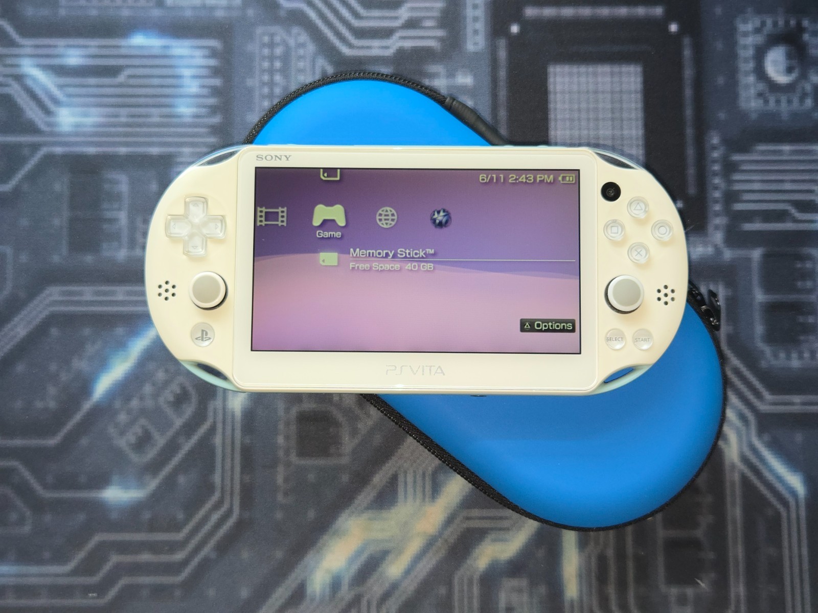 Light Blue/White Sony PlayStation PS Vita 2000 Slim – Handheld Console + Case