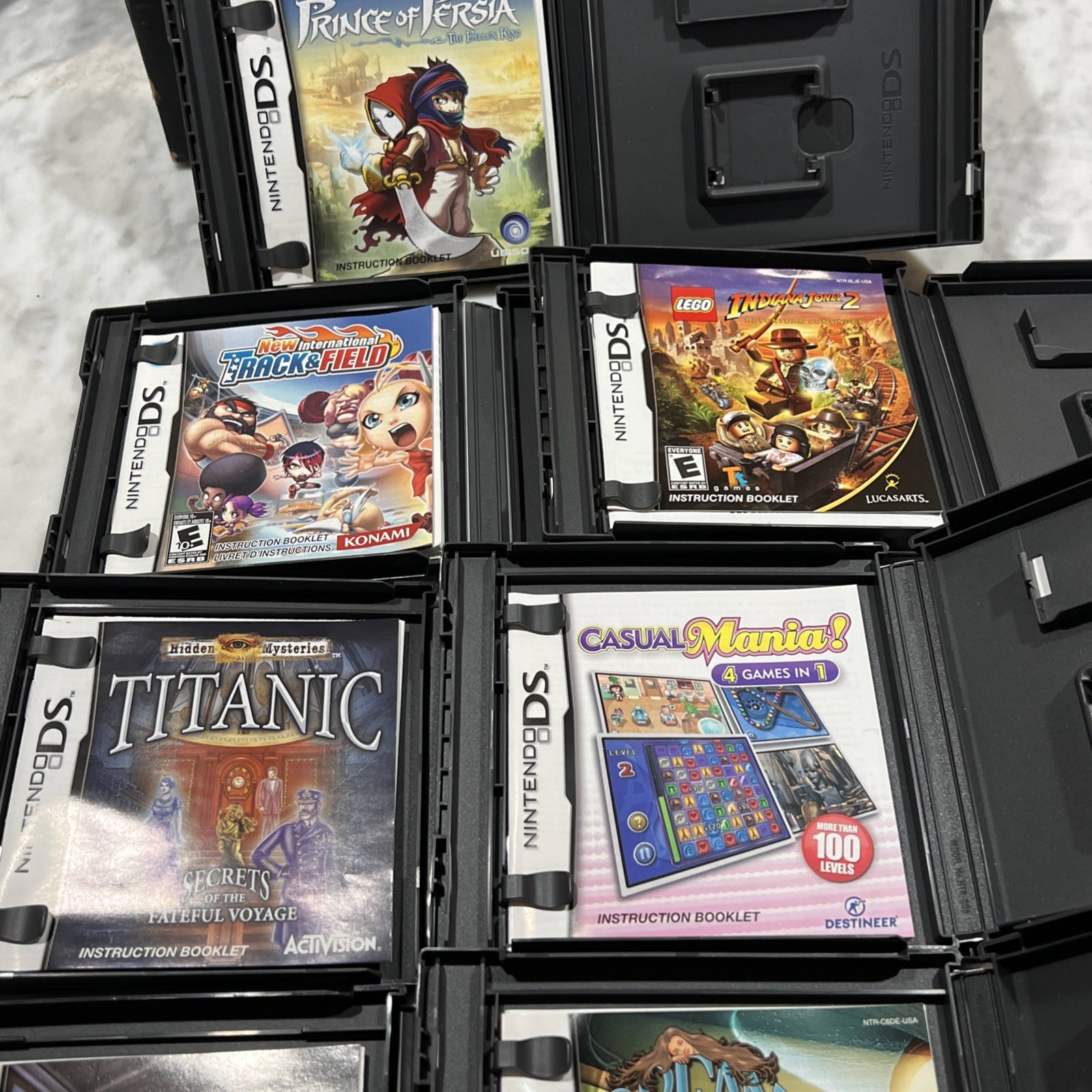 Nintendo DS Lite Cobalt Blue Console Bundle 9 Games New Battery Charger Cases