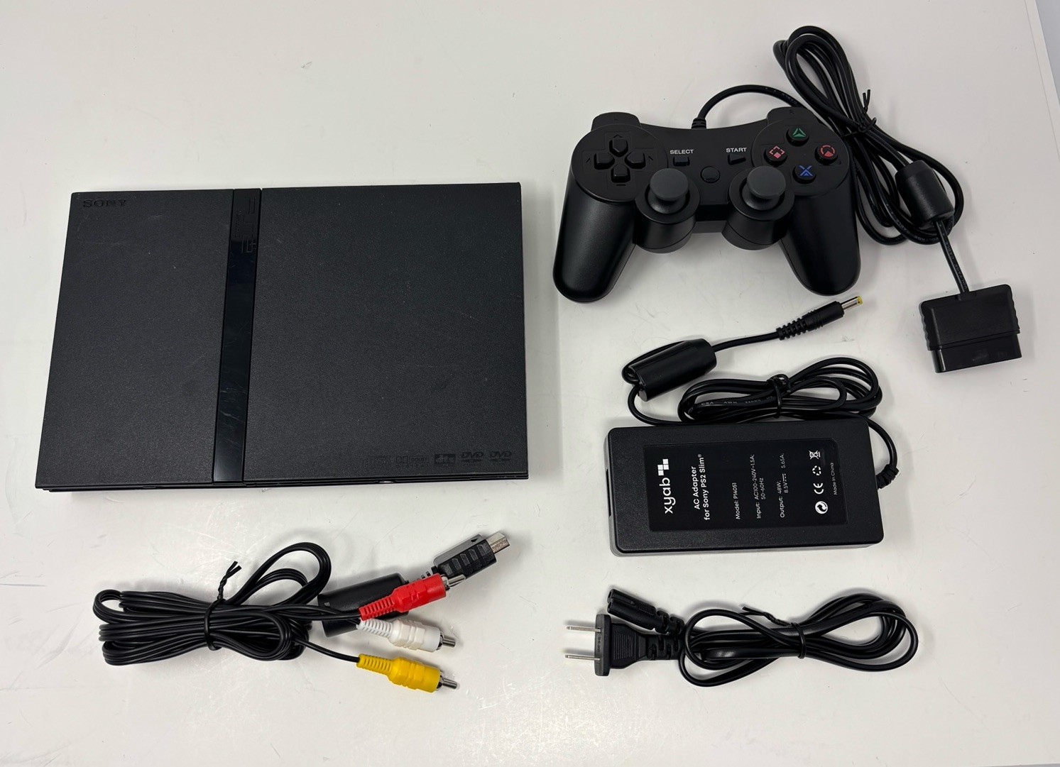 REFURBISHED – Sony PlayStation 2 PS2 Slim Console Bundle – NEW LENS + BATTERY