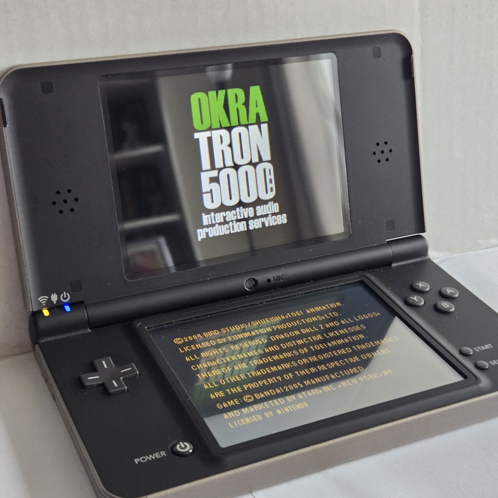 Nintendo DSi XL Bronze/Black Handheld Console Wi-Fi UTL-001 NTSC-U/C