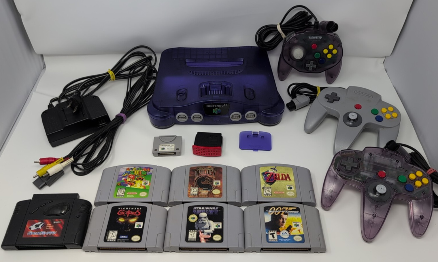 Nintendo 64 Funtastic Grape Console Lot 6 Games 3 Ctrls Exp & Ctrl Pak Gameshark