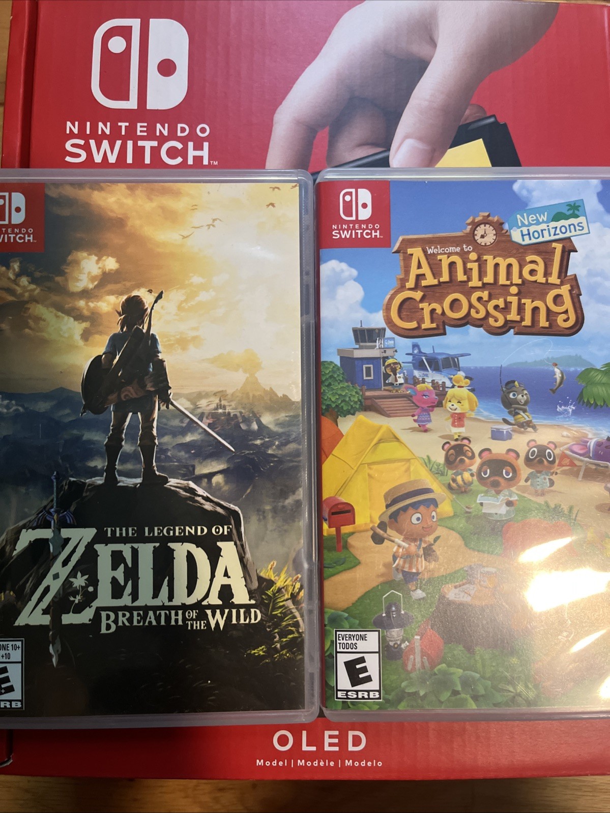 Nintendo Switch OLED Bundle With Animal Crossing And Zelda Breath Of The Wild