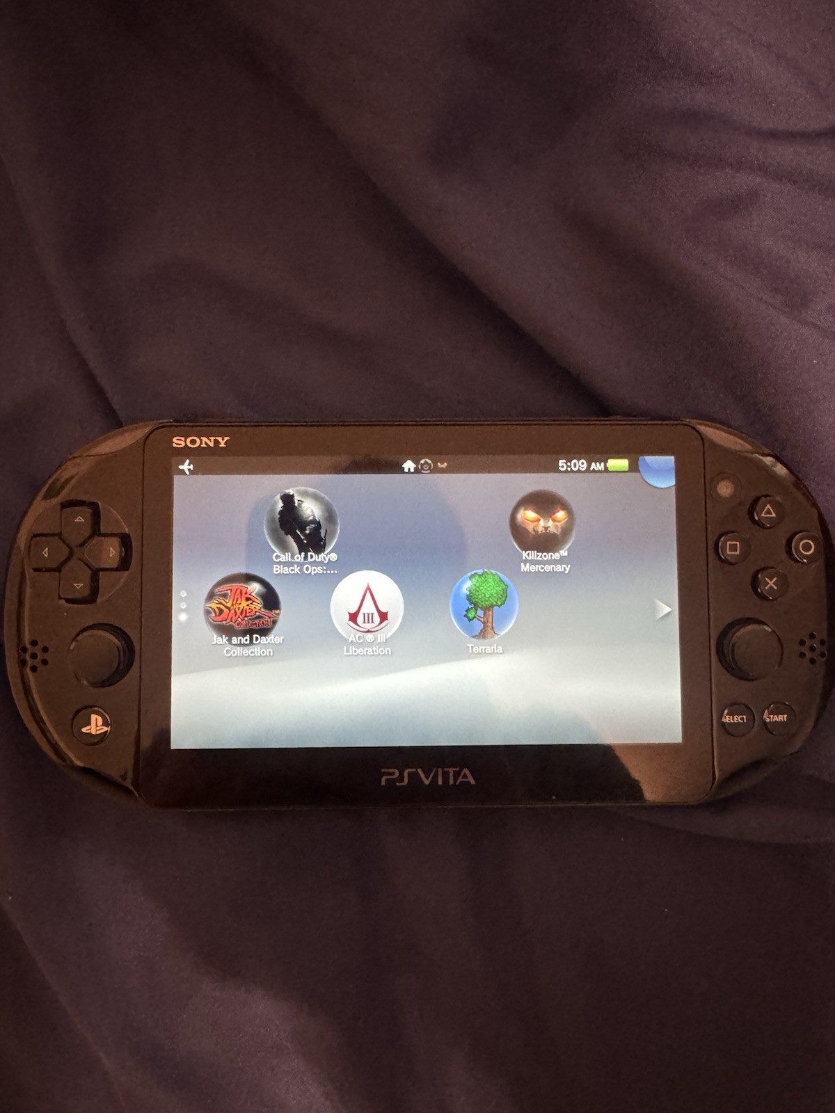Sony PS Vita Slim (PCH-2001 with 4 Games Case and Charger Included)