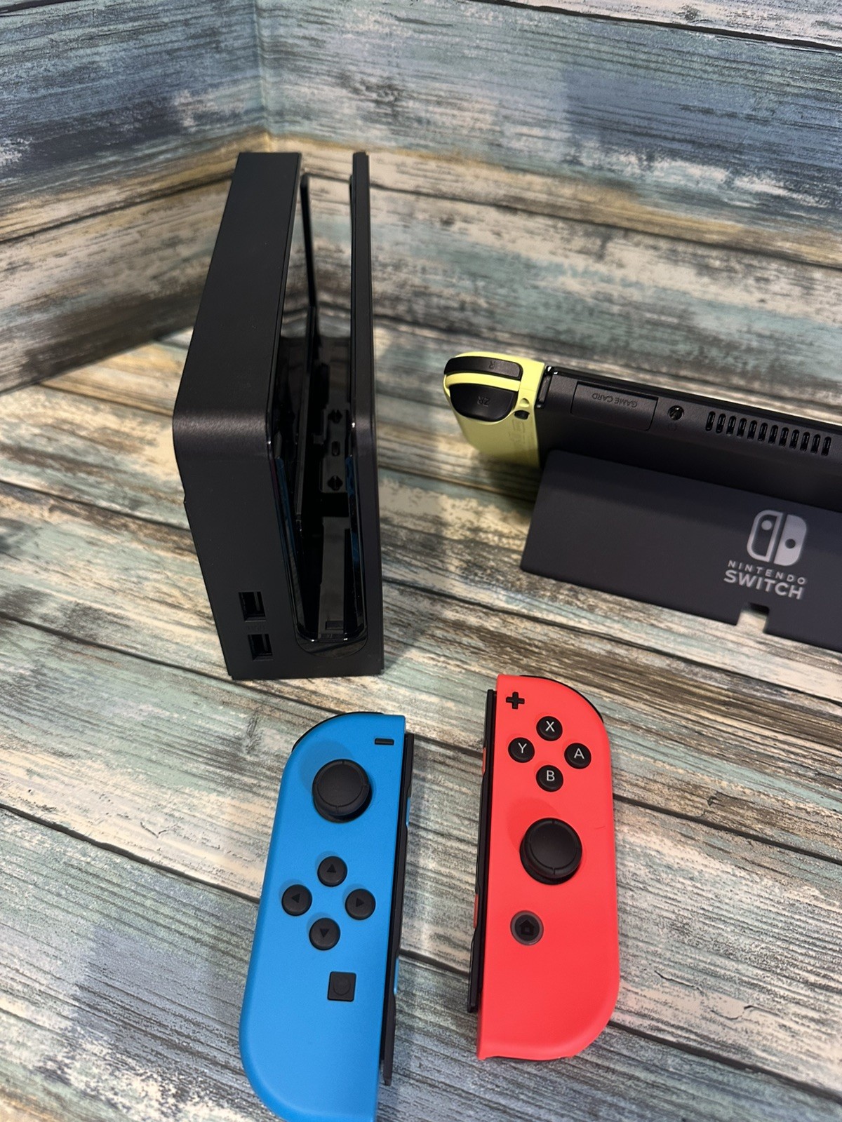 Nintendo Switch OLED Model w/ Neon Red & Neon Blue JoyCon Console + 2 JoyCons