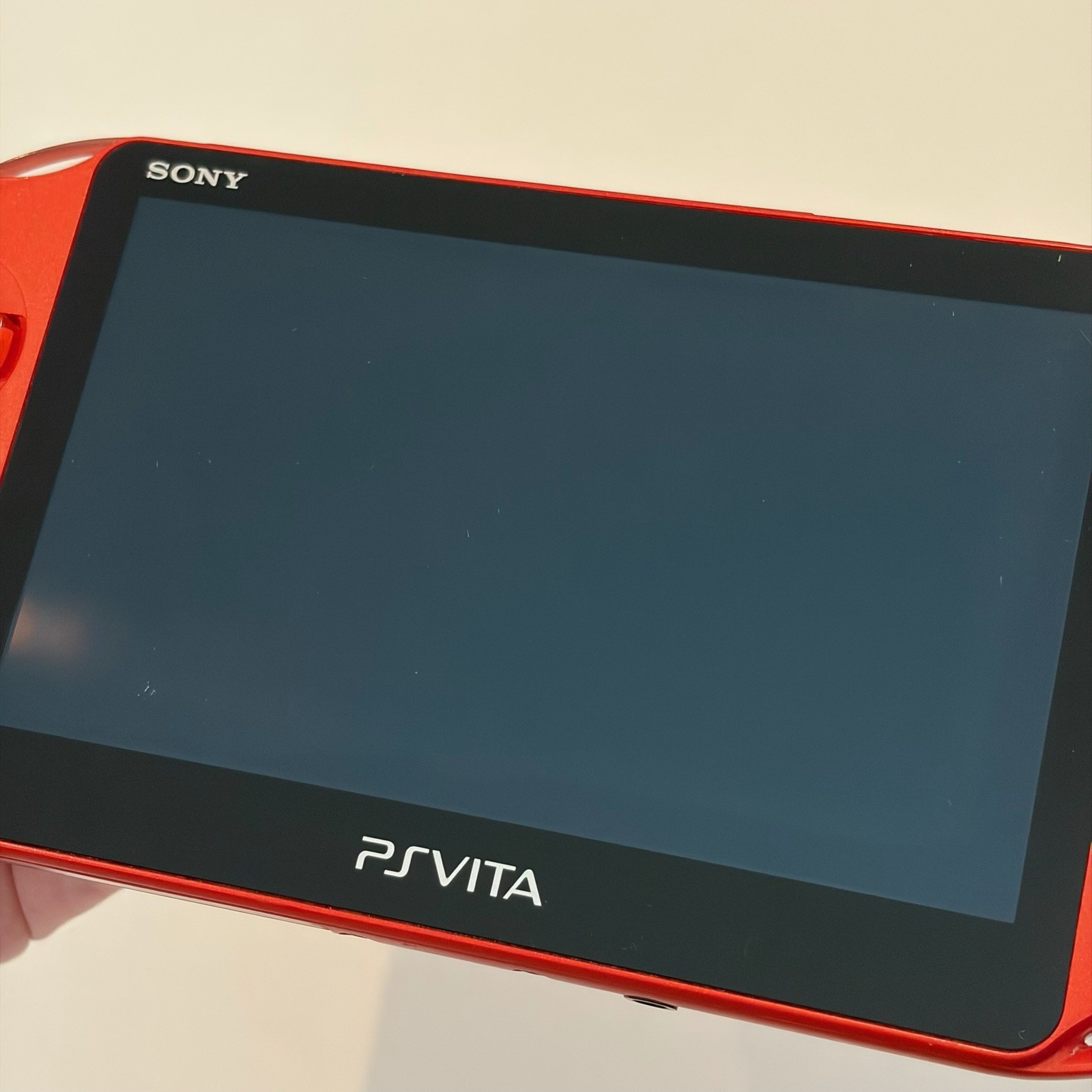 SONY PS Vita PCH-2000 Console Orange Very Good Fast Shipping No joystick drift.