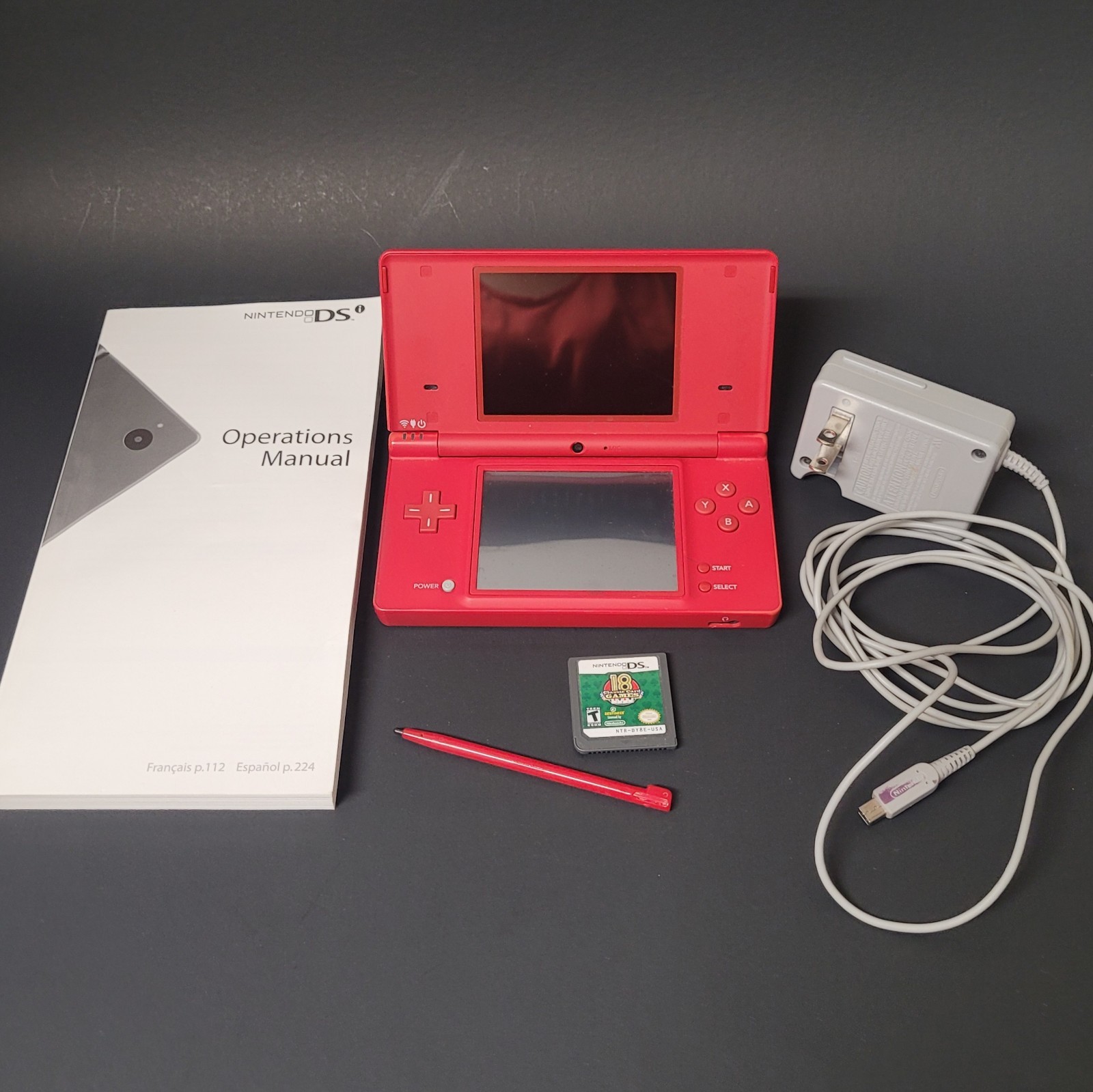 Nintendo DSi Red Handheld Console Game System w/ Charger Stylus Manual & Game
