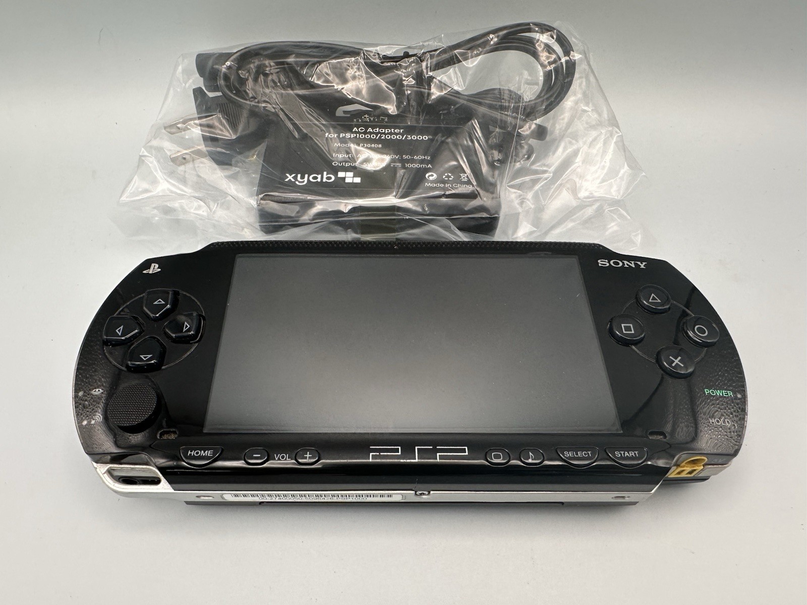 Sony PSP 1000 Black with new battery and charger – Tested, working, clean