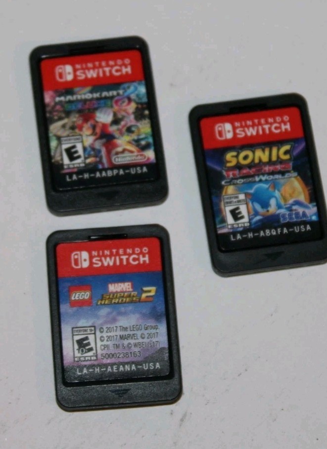Nintendo Switch Console Model HAC-001(01) Bundle w/ 3 Games, Carrying Case, Extr