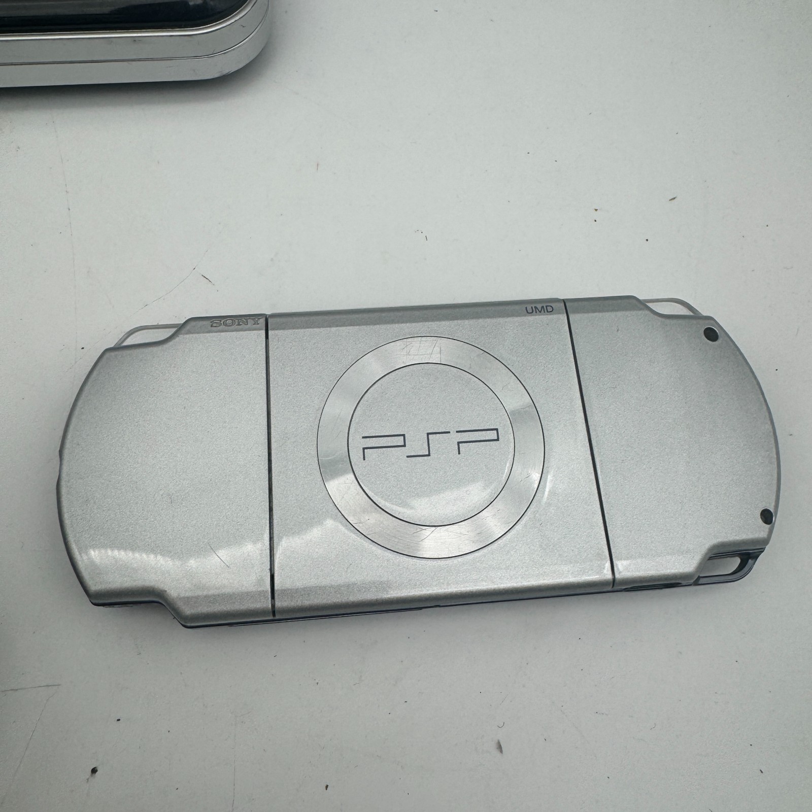 Silver PSP 2001 w/ Battery, Charger, Screen Protector (INCLUDES MEMORY STICK)